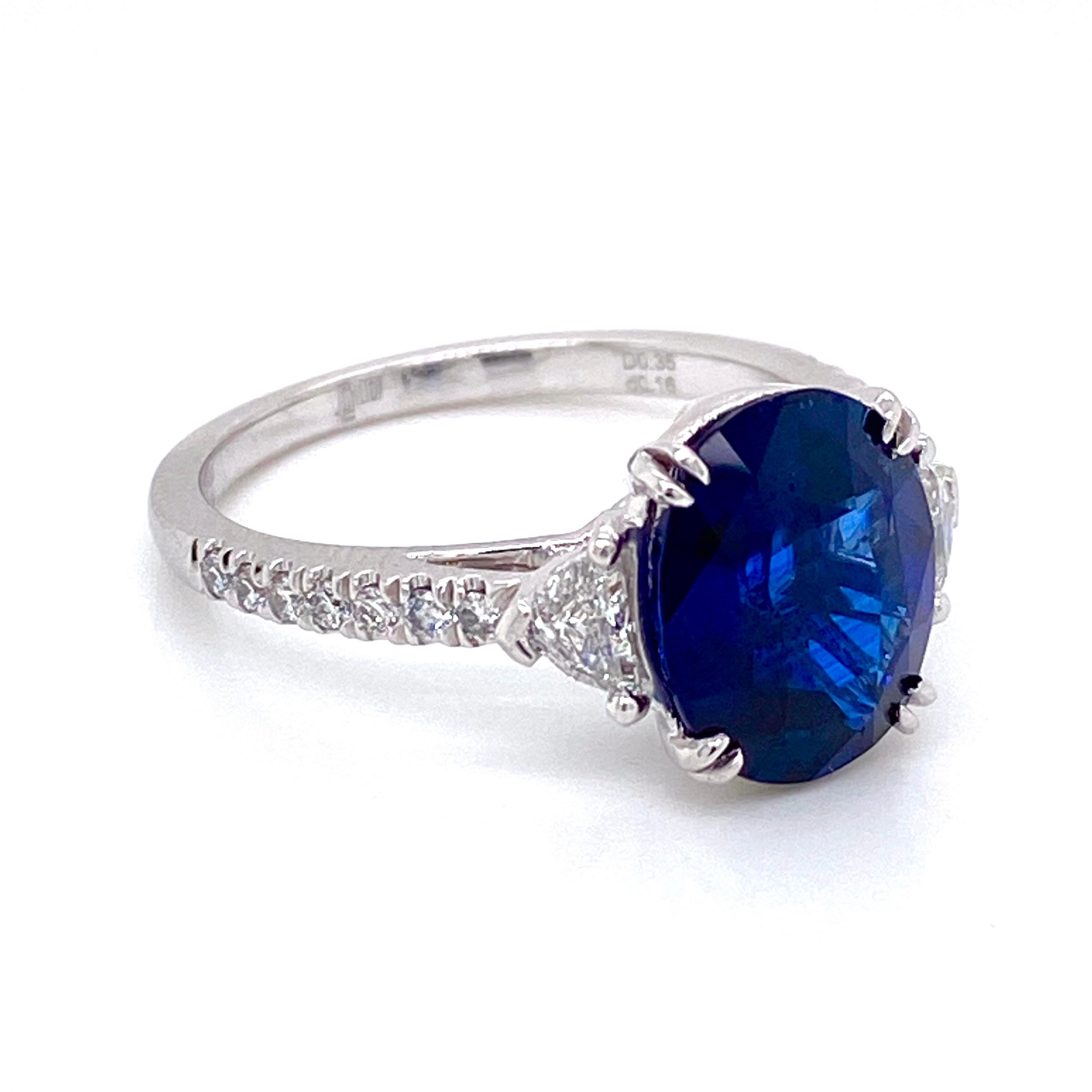 From the Emilio Jewelry Vault, Showcasing a stunning Gia certified 3.84 Carat natural Ceylon sapphire set in the center, with only heat treatment. The mounting was custom made around the center stone in platinum with .35ct epaulettes and .14ct round