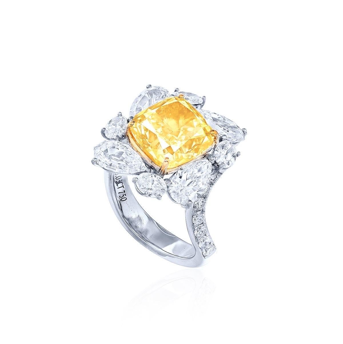 From the vault at Emilio Jewelry located on New York's iconic Fifth Avenue, 
Center Stone: 5.03 ct Fancy Yellow 
Setting: 34 white diamonds totaling about 0.44 carats, 4 fancy-turned oval white diamonds totaling about 0.55 carats, 4 fancy-turning