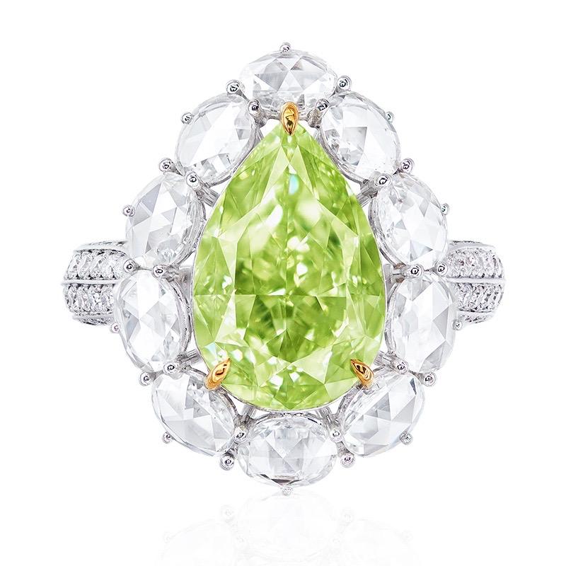 From the Museum Vault at Emilio Jewelry New York,
Main stone: Gia certified natural 5.50 carats Fancy yellow Green diamond. 
Setting: 107 white diamonds with a total of about 0.54 carats, 10 rose-cut white diamonds with a total of about 1.483