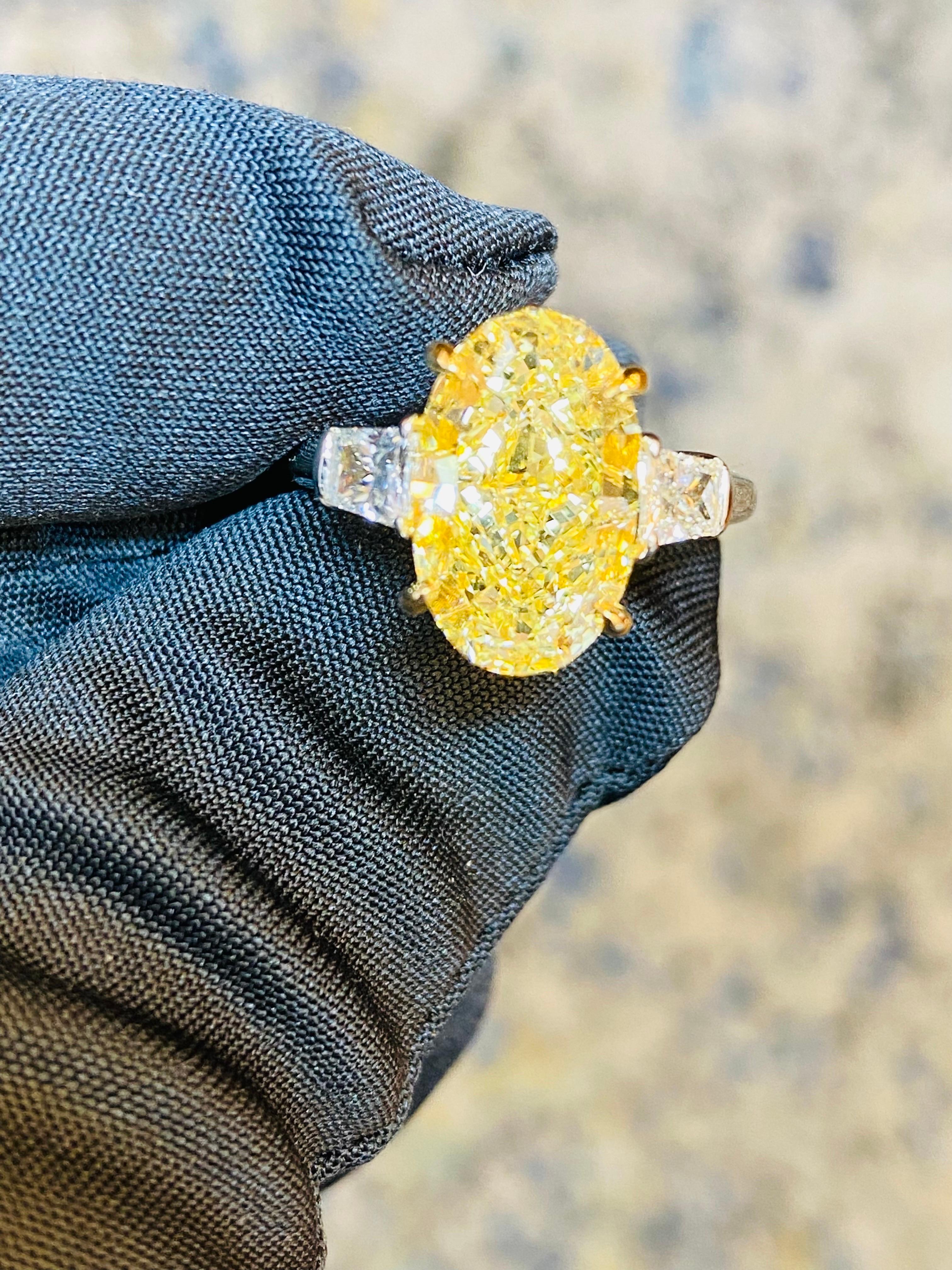 From The Vault at Emilio Jewelry Located on New York's iconic Fifth Avenue,
Showcasing a very special and rare Gia certified natural oval fancy yellow diamond. Gorgeous elongated shape and color! Please inquire for details. 
 Hand made in the Emilio