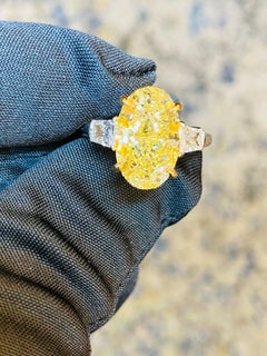 Emilio Jewelry GIA Certified 5.75 Carat Oval Fancy Yellow Diamond Ring
