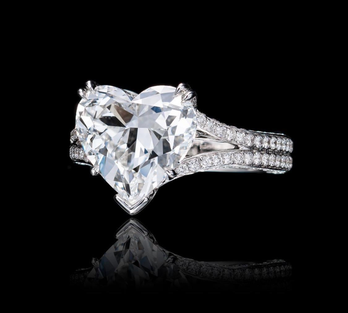 From The Vault at Emilio Jewelry Located on New York's iconic Fifth Avenue,
Inquire for detailed video! 
Showcasing a very special and rare Gia certified natural F color heart shape diamond center just over 5 carats. Total weight shown in title. 
