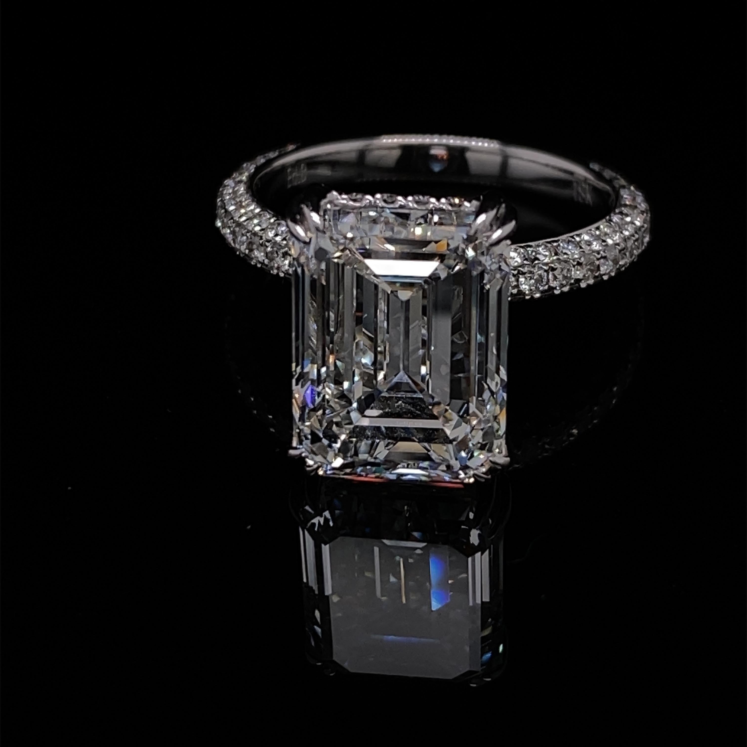 2.5 carat emerald cut diamond on hand