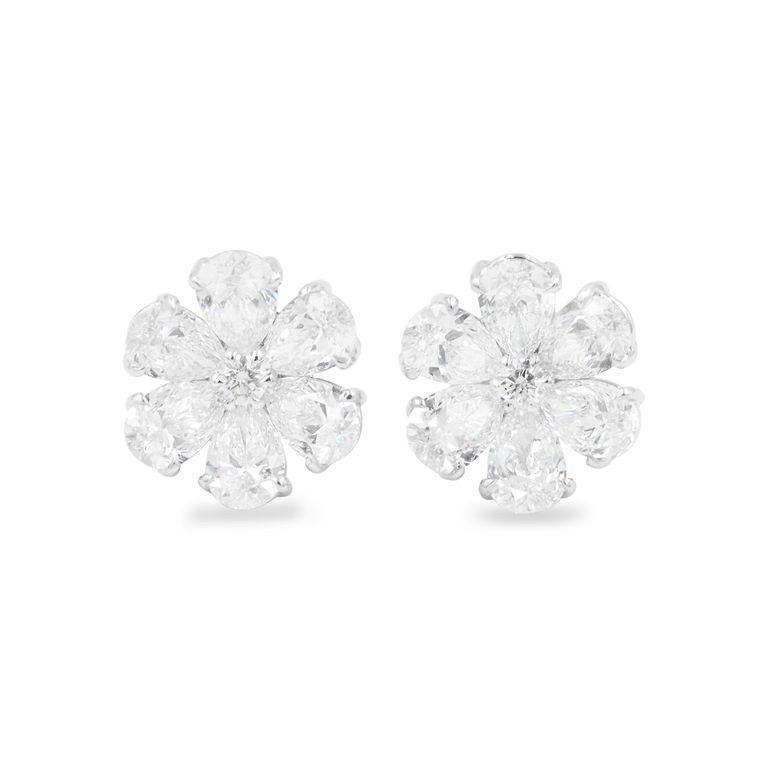EARRING 18KT Gold
From Emilio Jewelry, a well known and respected wholesaler/dealer located on New York’s iconic Fifth Avenue, 
Size of each diamond: .50 or half a carat 
Color Clarity: D-E-F and Vs2 or Better 
Total weight: 6.31ct 
Please inquire