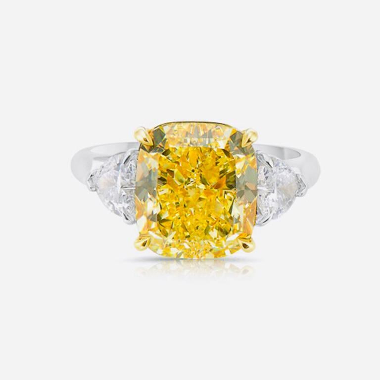 From The Vault at Emilio Jewelry Located on New York's iconic Fifth Avenue,
Showcasing a very special and rare Gia certified natural fancy intense yellow diamond in the center. Please inquire for details. 
We specialize in creating special mountings