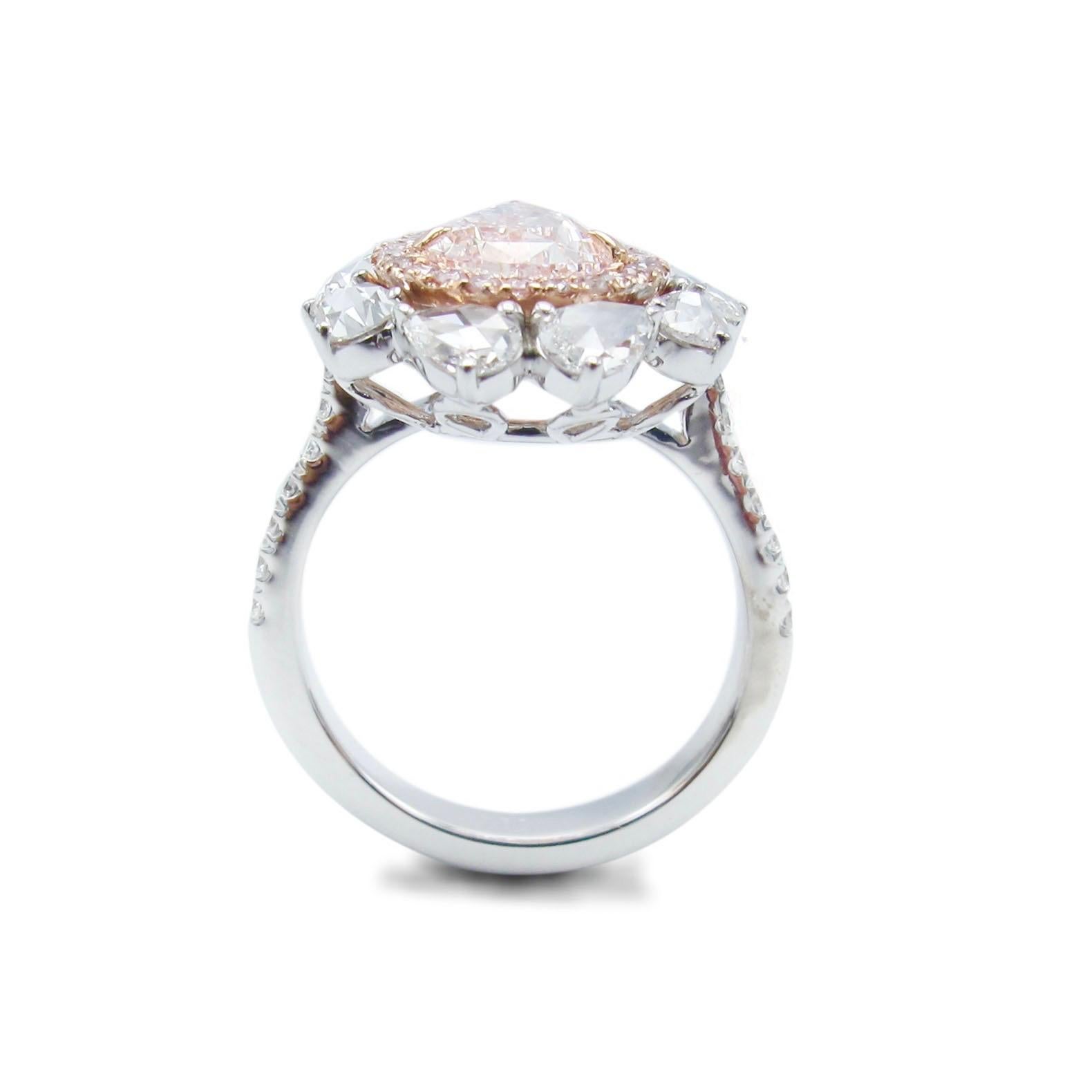  From The Museum Vault at Emilio Jewelry Located on New York's iconic Fifth Avenue,
Showcasing a very special and rare Gia certified natural fancy light pink diamond center with no overtone and is pure pink.  
We specialize in creating special