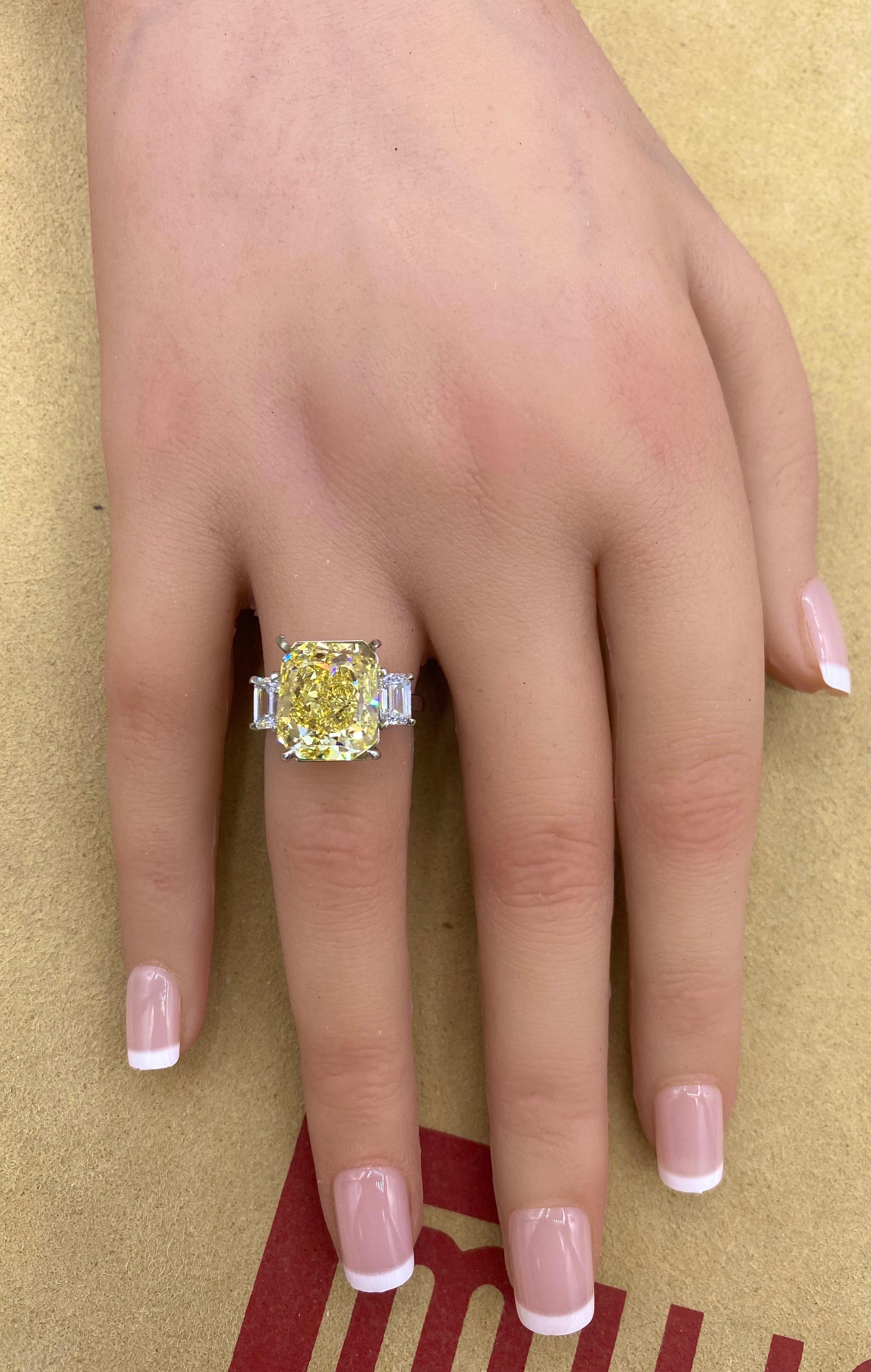 From Emilio Jewelry, a well known and respected wholesaler/dealer located on New York’s iconic Fifth Avenue, 
Featuring one of the most magnificent Fancy Intense Yellow Diamonds. Total weight listed in title. 
Please inquire for more images,