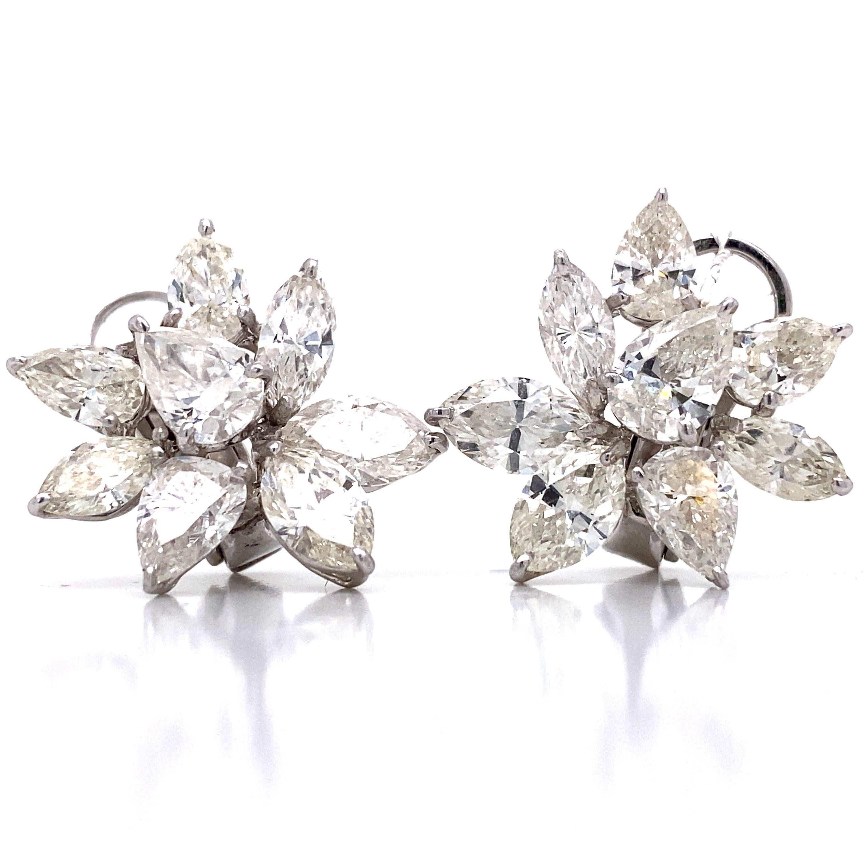 From the Vault at Emilio Jewelry New York, and hand made in our atelier,
A Pair of gorgeous striking classy cluster earrings. Each and every diamond is Gia certified. The sizes of the diamonds are listed below with the color and clarity. Please