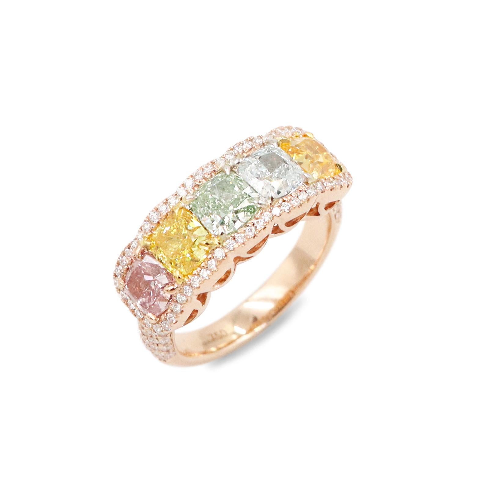 From the Museum Vault At Emilio Jewelry, a dealer located on New York's iconic Fifth Avenue,
Featuring a one of a kind diamond band set with 5 ultra rare Gia certified natural fancy rare color diamonds
1. Intense purplish Pink 
2. Vivid yellow 
3.
