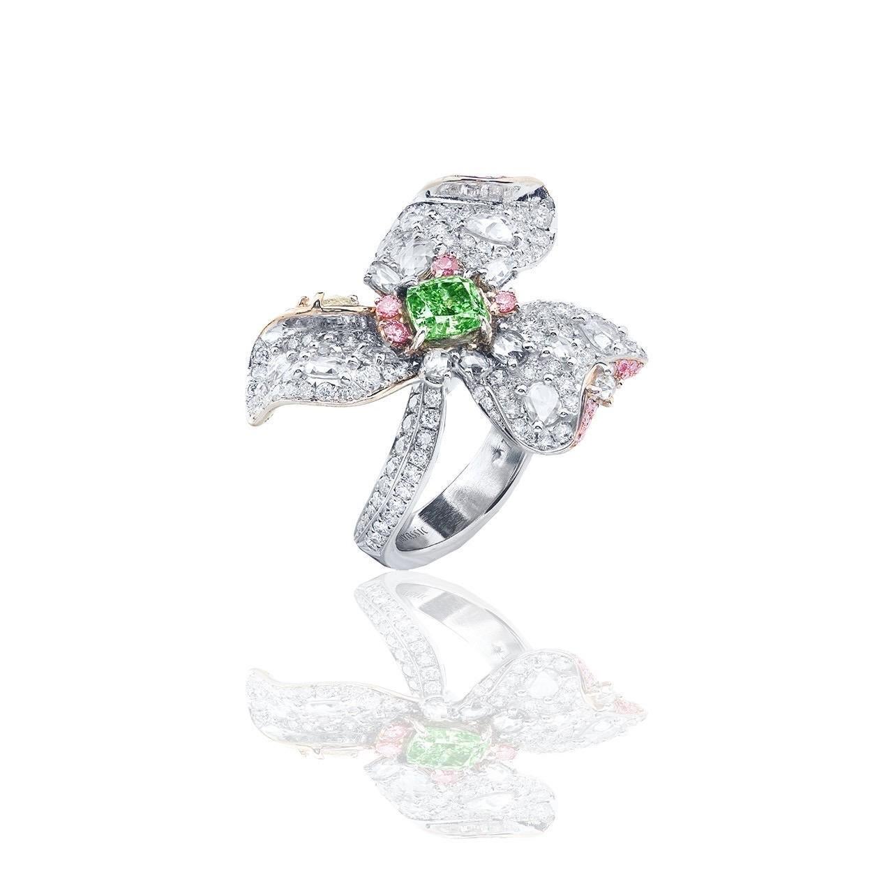 From Emilio Jewelry, a well known and respected wholesaler/dealer located on New York’s iconic Fifth Avenue, 
.88ct + Gia Certified natural Fancy Intense pure straight green Diamond center no overtone. 
Clarity: Vs 
Please inquire for more images,