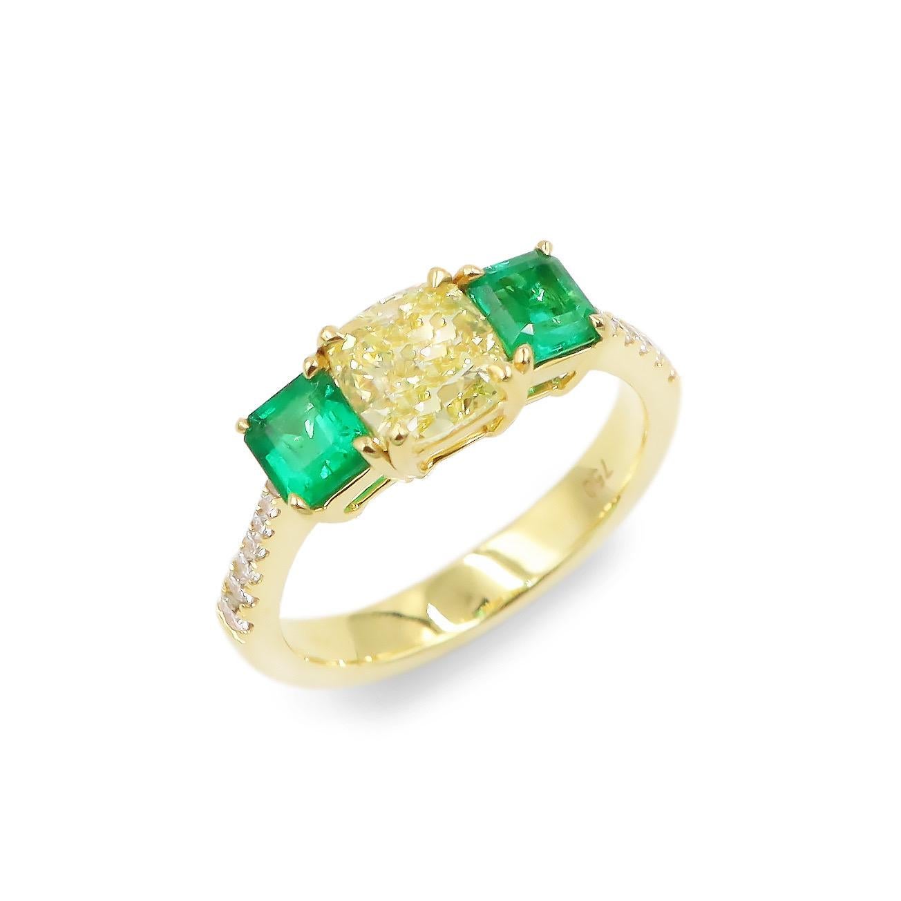 Gia Certified intense yellow 1.50cts
RING 18KT Gold
Diamond Weight: 1.65 carats
Emerald Stone Weight: 0.70ct great clarity super color 
Please inquire for additional details. All pieces are hand made in the Emilio Jewelry Atelier. Our brand is