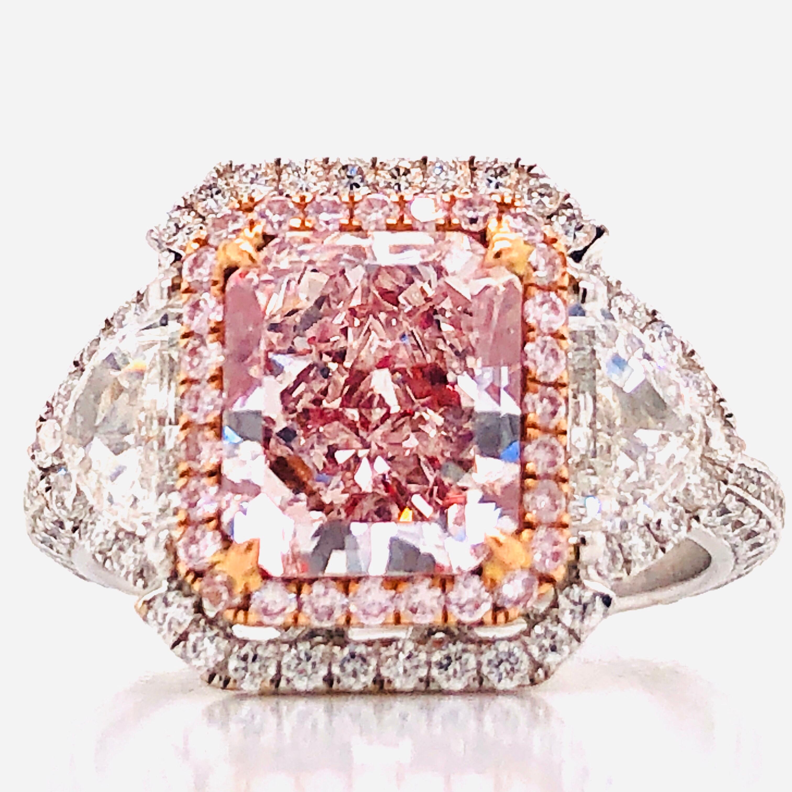 Showcasing a very special and rare natural 3 carat radiant fancy light straight pink diamond ring certified by GIA. We are proud to showcase one of the very few if any at all in this size on market. Hand made in the Emilio Jewelry Atelier, whom