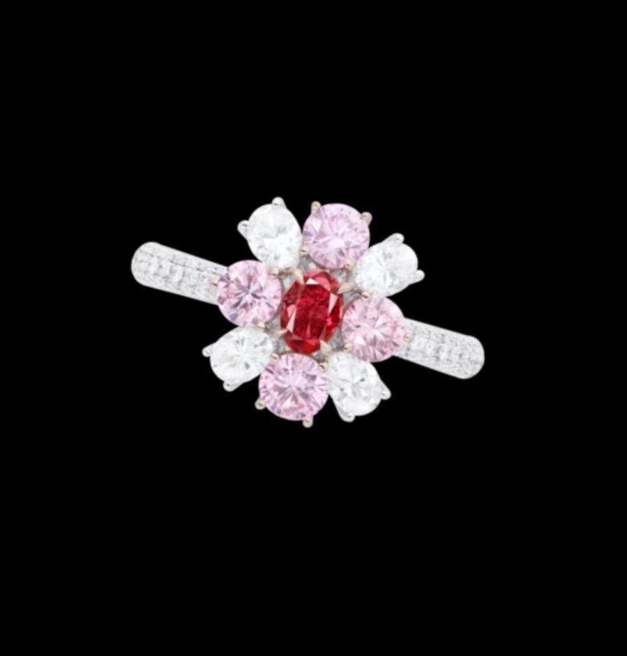 From the Emilio Jewelry Museum Vault, Showcasing a stunning certified .30ct carat Gia certified natural fancy pure red diamond set in the center. 
We are experts at creating jewels for these very special collectible diamonds. If you have another