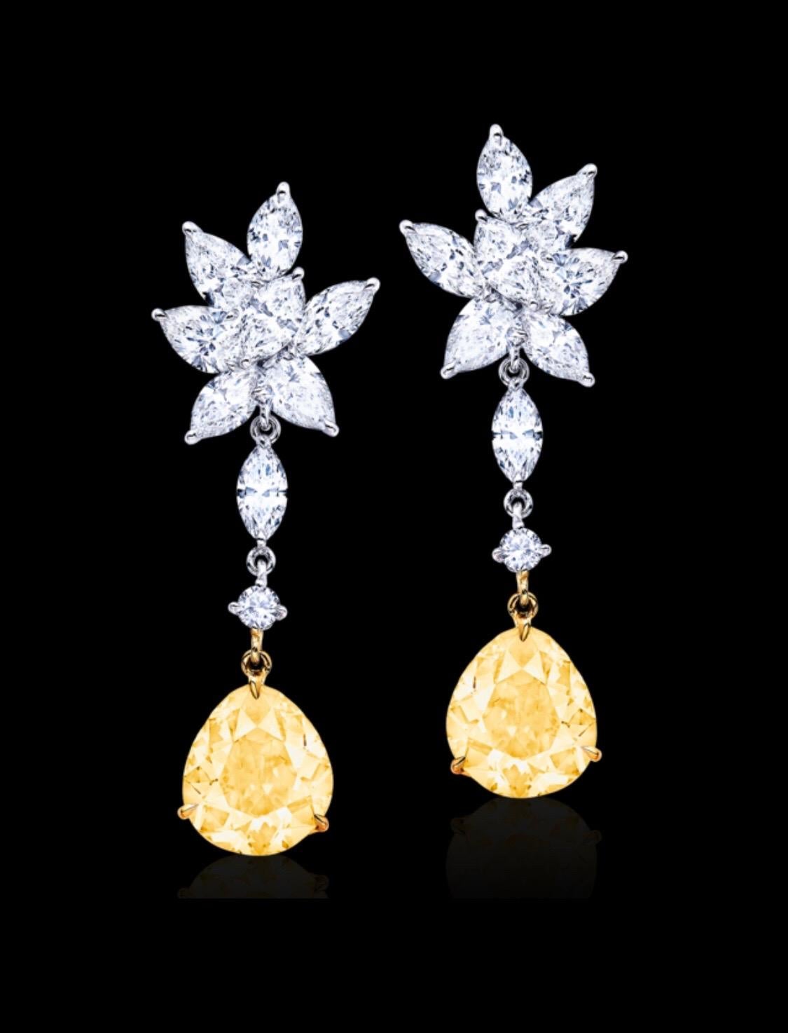 Showcasing a pair of gorgeous fancy yellow pear shapes weighing 4.50ct certified by GIA. Hand made in the Emilio Jewelry Atelier, whom specializes in rare collectible pieces in the Natural ultra rare fancy colored Diamond sector.
Please inquire for