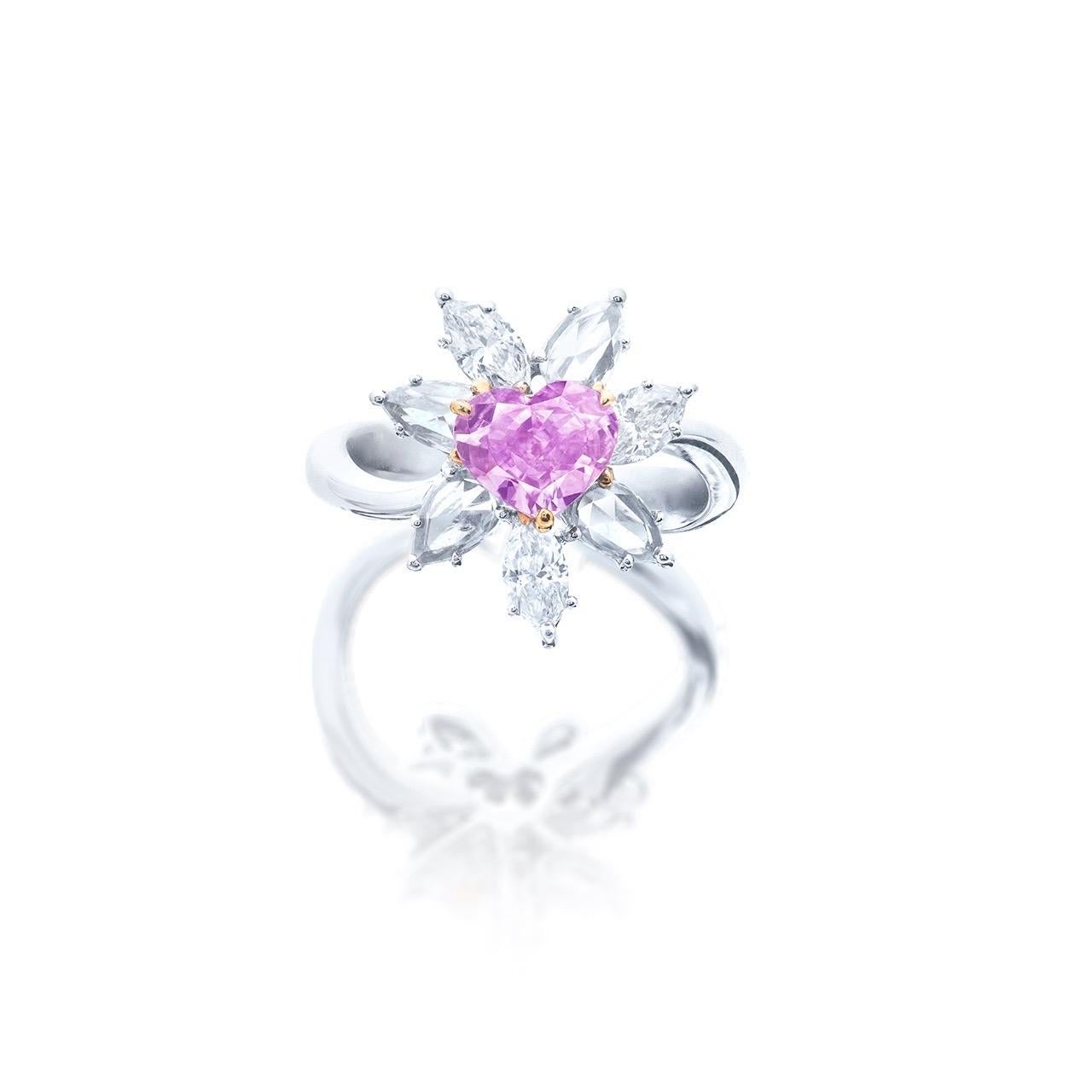 From Emilio Jewelry a dealer and wholesaler Located on New York's iconic Fifth Avenue,
Main stone: 1.00 carat + Fancy Intense Pinkish Purple
mounting: 3 fancy-turned marquise white diamonds totaling approximately 0.501 carats, 4 rose-cut white