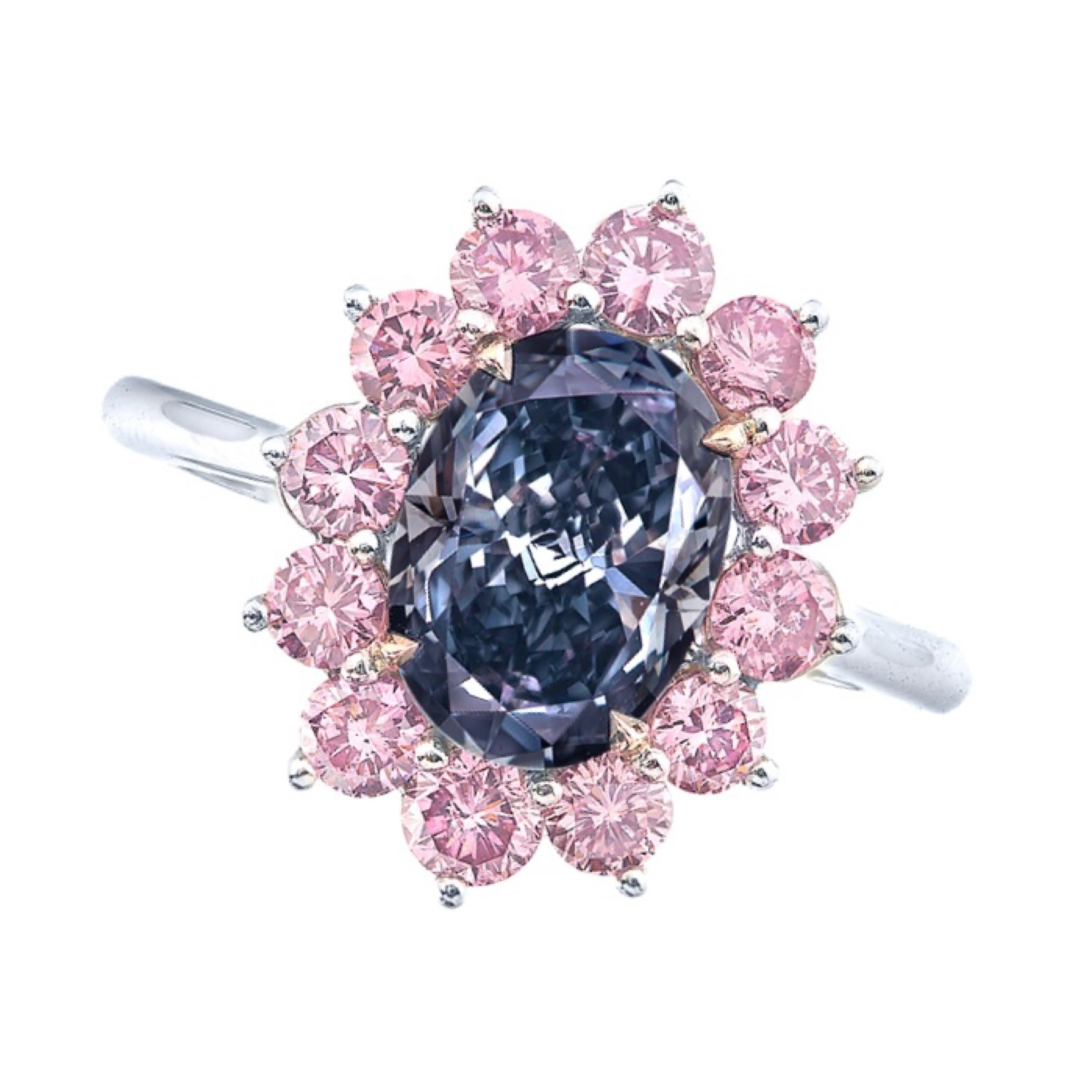 From Emilio Jewelry New York, 
Main Stone: Gia Certified natural 2.00 carat + Fancy Deep Blue 
Clarity: Vs 	
Matching setting: 12 pink diamonds with a total of about 1.10 carats