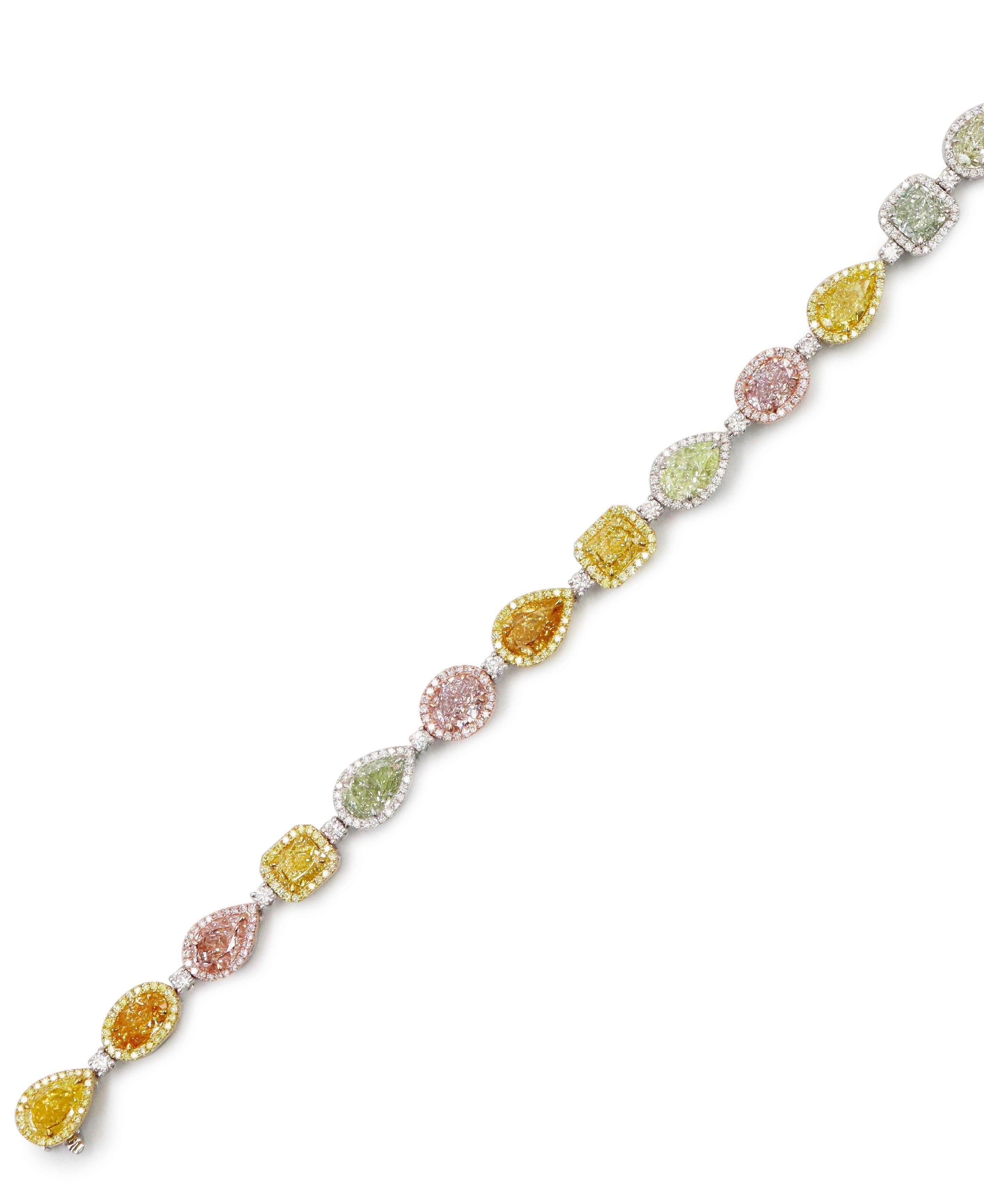 From Emilio Jewelry, a well known and respected wholesaler/dealer located on New York’s iconic Fifth Avenue,
Featuring some of the rarest Gia certified natural Fancy exotic color diamonds all set in one bracelet, ranging from pink,green, orange,