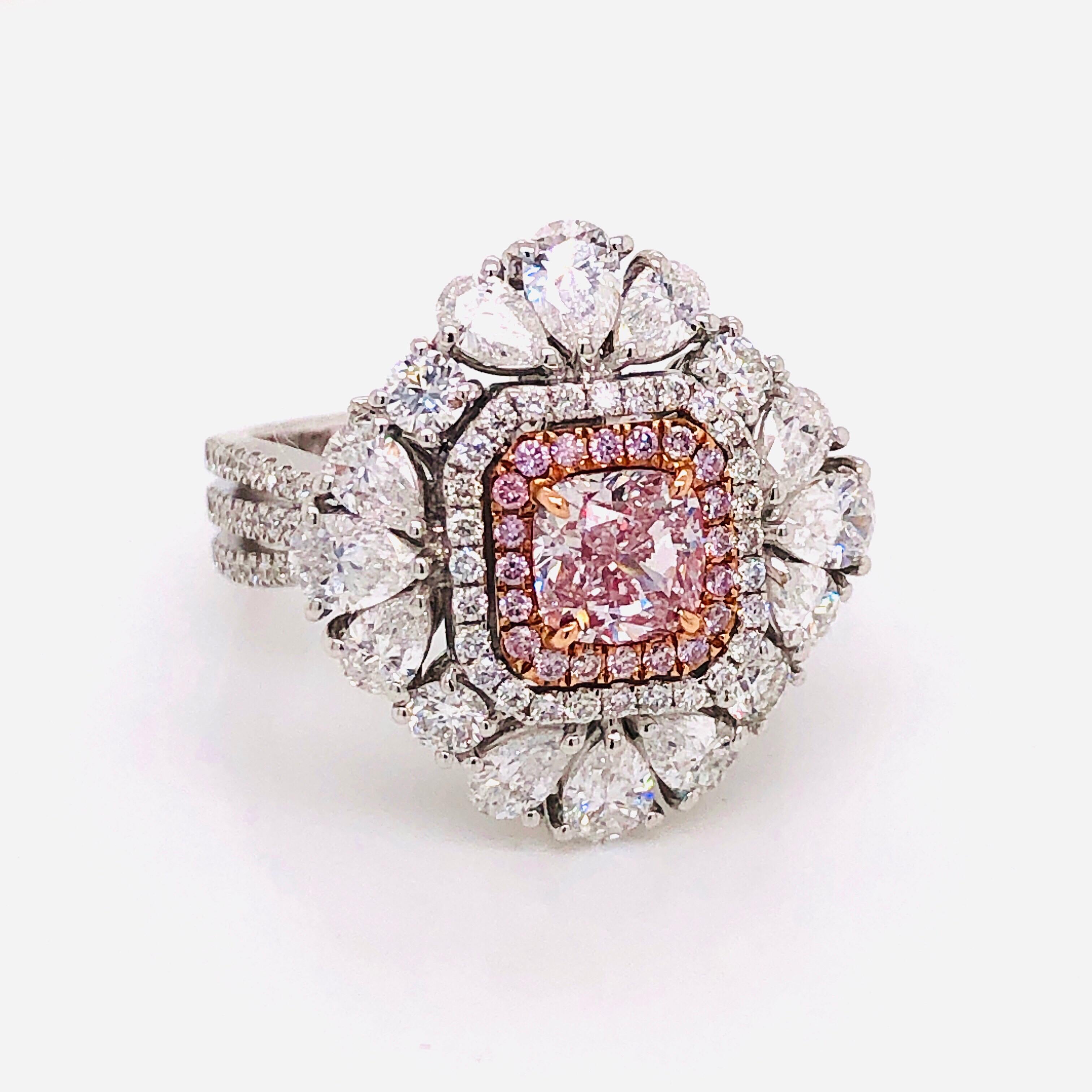 Hand made in the Emilio Atelier Showcasing a spectacular GIA certified 1.01ct Natural Fancy F. Pink with excellent saturation throughout. The clarity is Vs2. Please send us a message to request a copy of the GIA report. This design features a