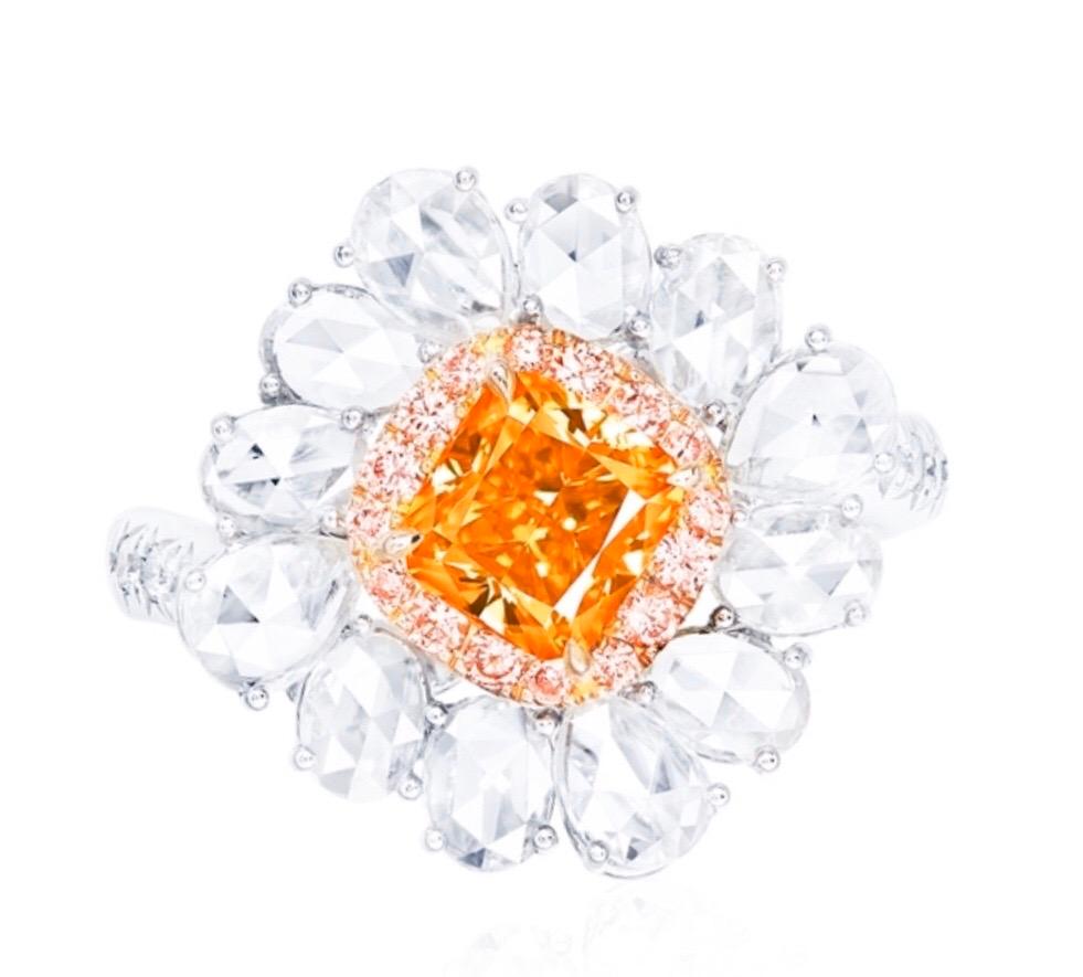 Showcasing a very special and rare natural 1 carat  fancy vivid orange diamond ring certified by GIA. We are proud to showcase one of the very few if any at all in this size on market. Hand made in the Emilio Jewelry Atelier, whom specializes in