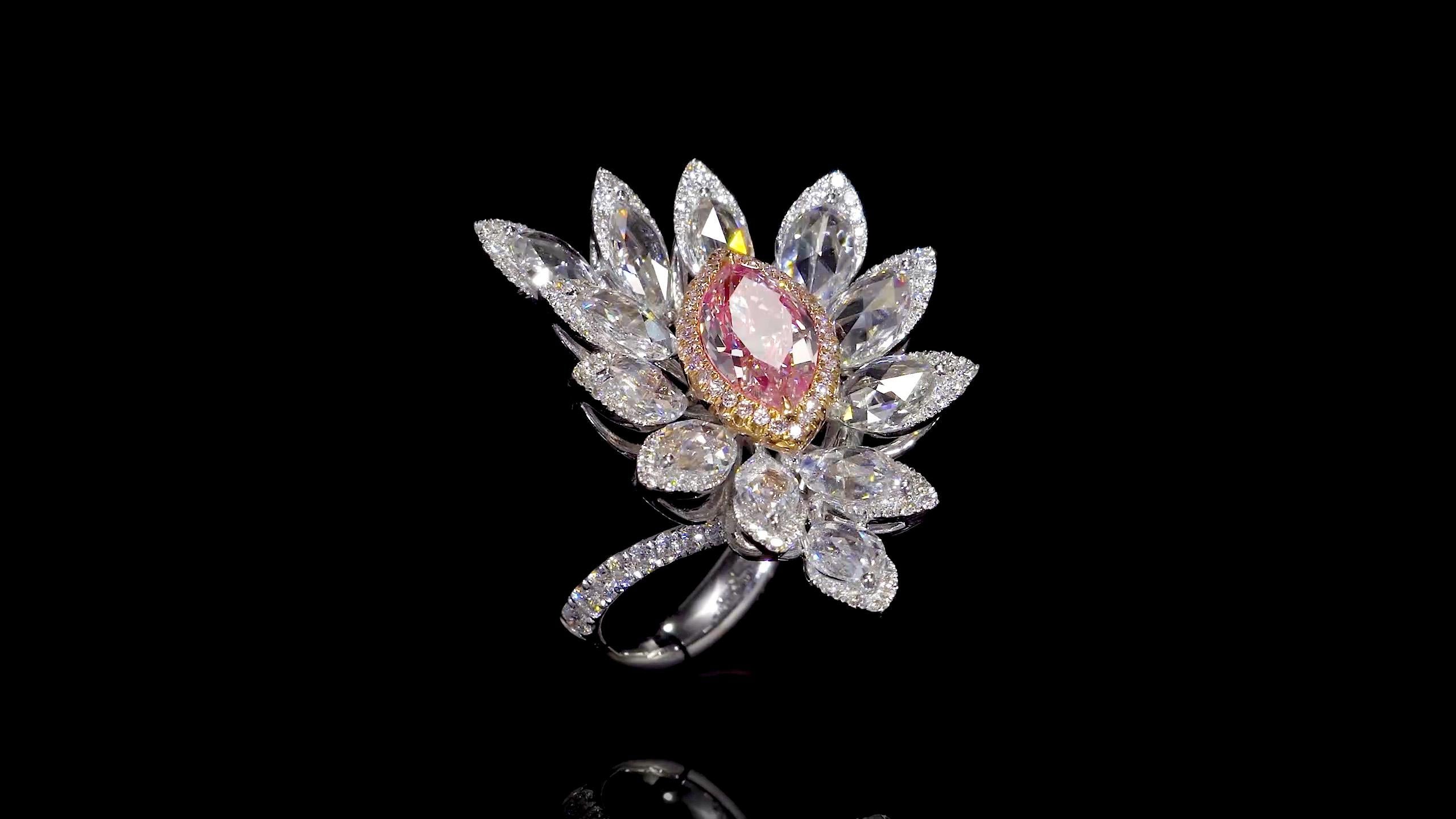 From The Museum Vault At Emilio Jewelry New York,
An earring and ring set of magnificent natural Gia certified Fancy B. Pink Diamonds. After Emilio Jewelry created this magnificent mounting, to bring out the very best potential of these rare