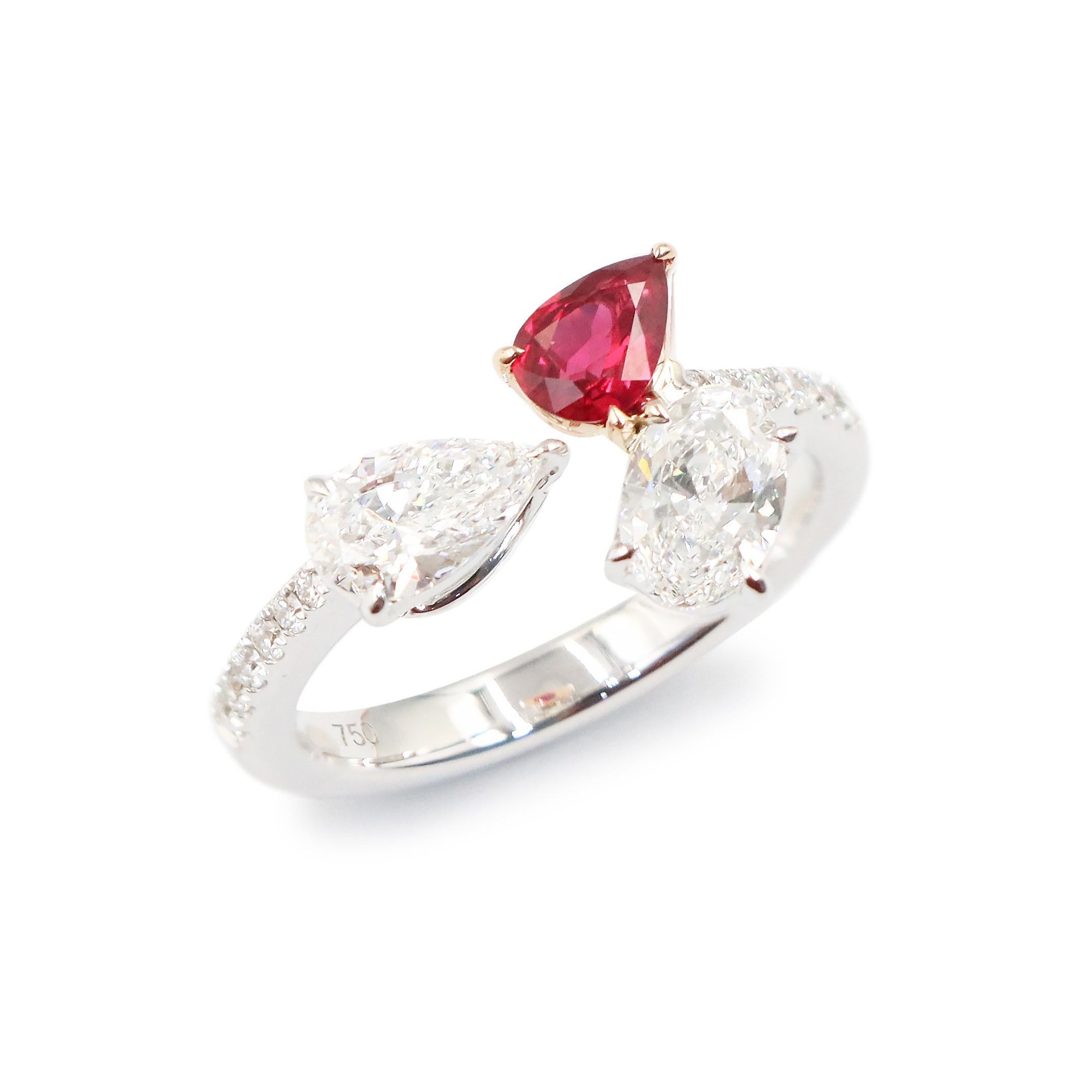 From the vault at Emilio Jewelry located on New York's iconic 5th Ave,
Gia certified .50pt diamond 
Diamond Weight: 1.14 carats
Ruby Stone Weight: 0.41 Breathtaking pigeon blood vivid red color 
Please inquire for additional details. All pieces are