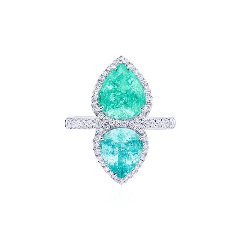 From the vault at Emilio Jewelry, a dealer located on New York's iconic 5th Avenue,

Center Stones: Gia certified 3.00 ct Bluish Green PEAR, 1.90 + ct Green-Blue PEAR
Matching: 66 white diamonds totaling about 0.40 carats, 	

Paraiba State, located