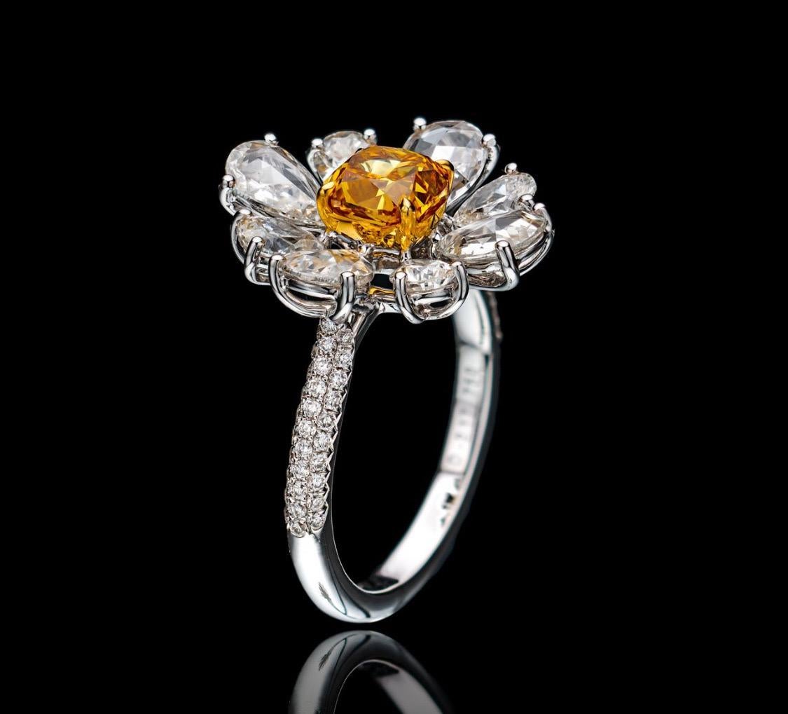 From The Museum Vault at Emilio Jewelry Located on New York's iconic Fifth Avenue,
Inquire for detailed video! 
Showcasing a very special and rare Gia certified natural vivid orange yellow weighing 1 carat diamond ring.  We specialize in creating