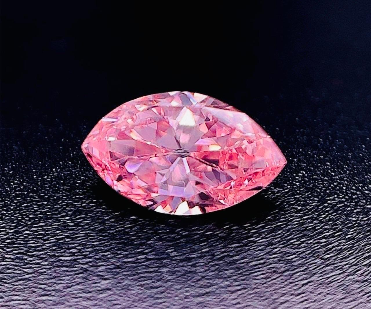 From Emilio Jewelry, a well known and respected wholesaler/dealer located on New York’s iconic Fifth Avenue, 
Featuring one of the rarest shapes, combined with the rarest color saturation of natural pink diamonds equals a perfect investment diamond!