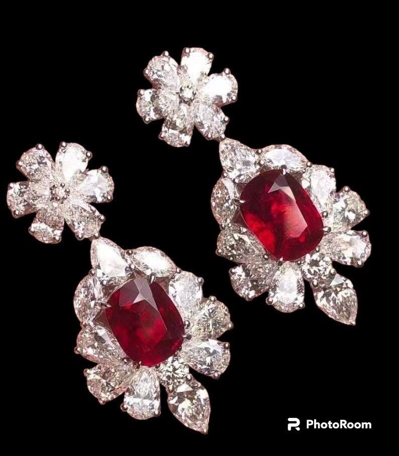 From Emilio Jewelry, a well known and respected wholesaler/dealer located on New York’s iconic Fifth Avenue, 
Featuring two Grs Certified Burma Rubies
Untreated , Unheated 
Pigeons Blood 
High Clarity 
Over 2.00 Carats Each. Set with over 7 Carats