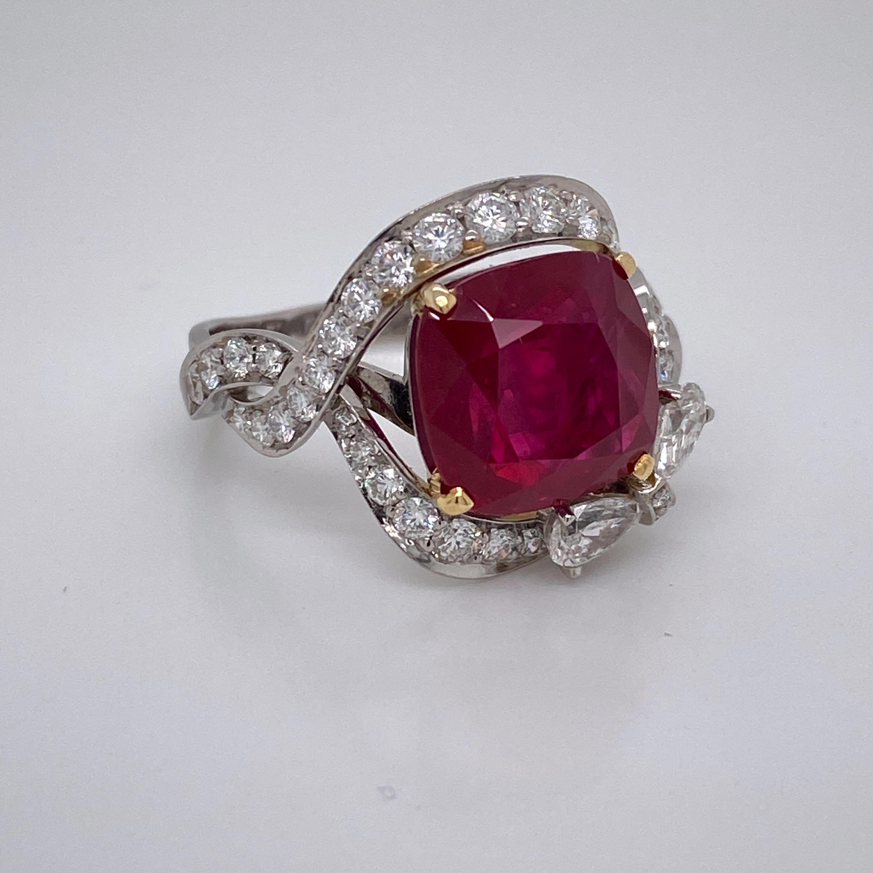 From the Emilio Jewelry Vault, Showcasing a stunning 6.50 carat center Grs Certified as Vivid Red/Pigeons blood. The best color grading possible for a ruby. Burmese rubies of this size are hard to get a hold of, specially with such a color. The ruby