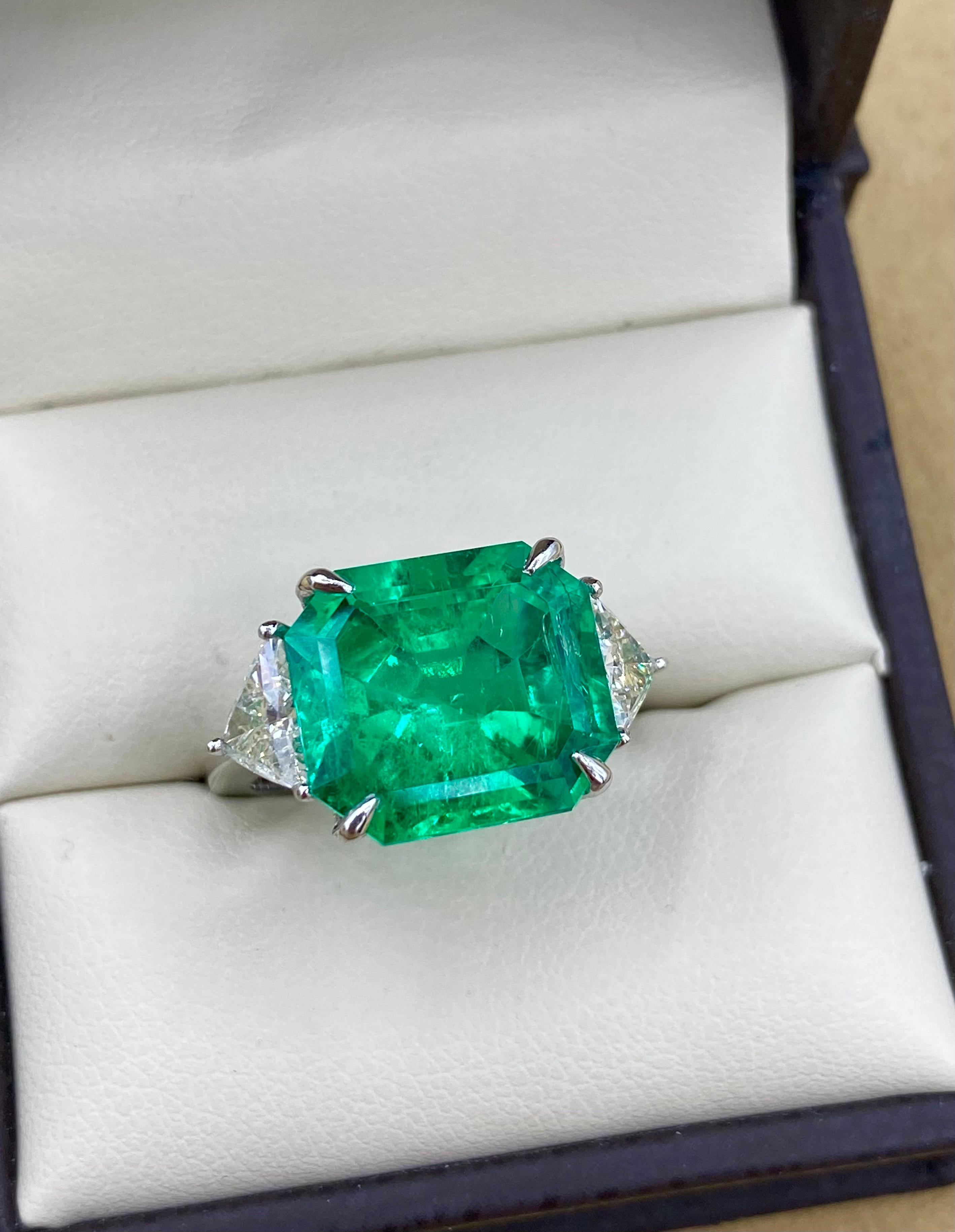 From the private collection of Emilio Jewelry located on New York's iconic Fifth Avenue,
One of the highest quality, rarest Muzo  Colombian emeralds we have ever seen is the focal point of this ring for those who want the Best of the best! The