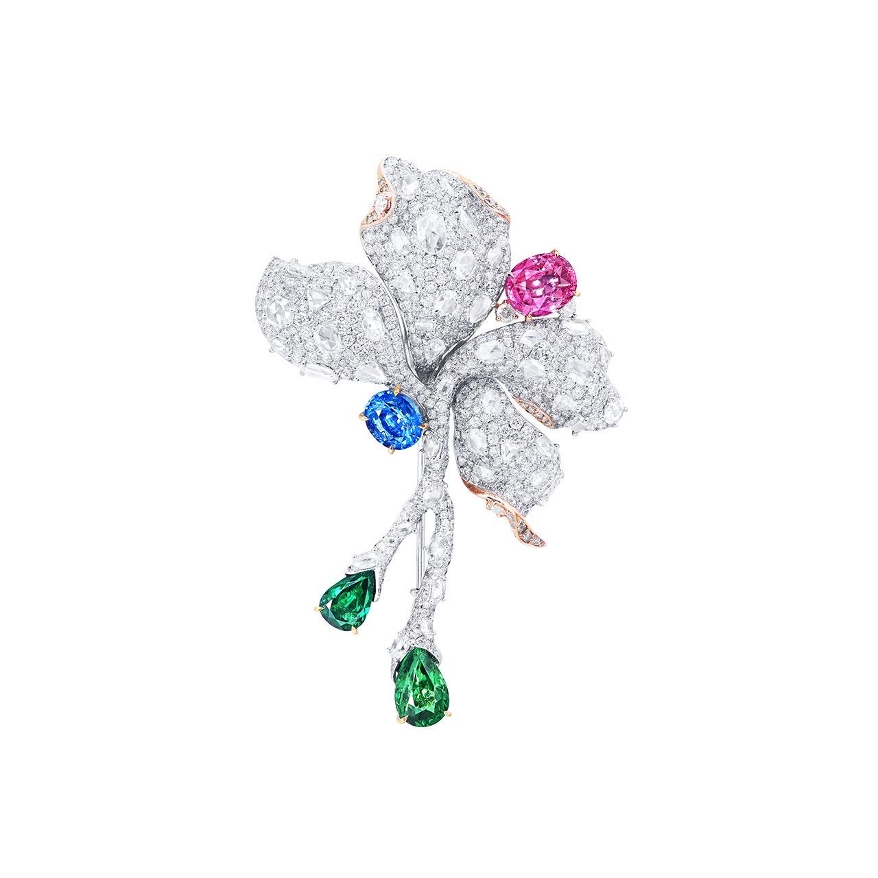 From the vault at Emilio Jewelry Located on New York's iconic 5th Avenue,
Main Stone: Sapphire over 1.70 carat Blue (Cornflower Blue), Pink 2.00 + carat, Tsavorite 1.11 carat, Tsavorite 2.16 carat
Matching: 232 white diamonds totaling about 1.20