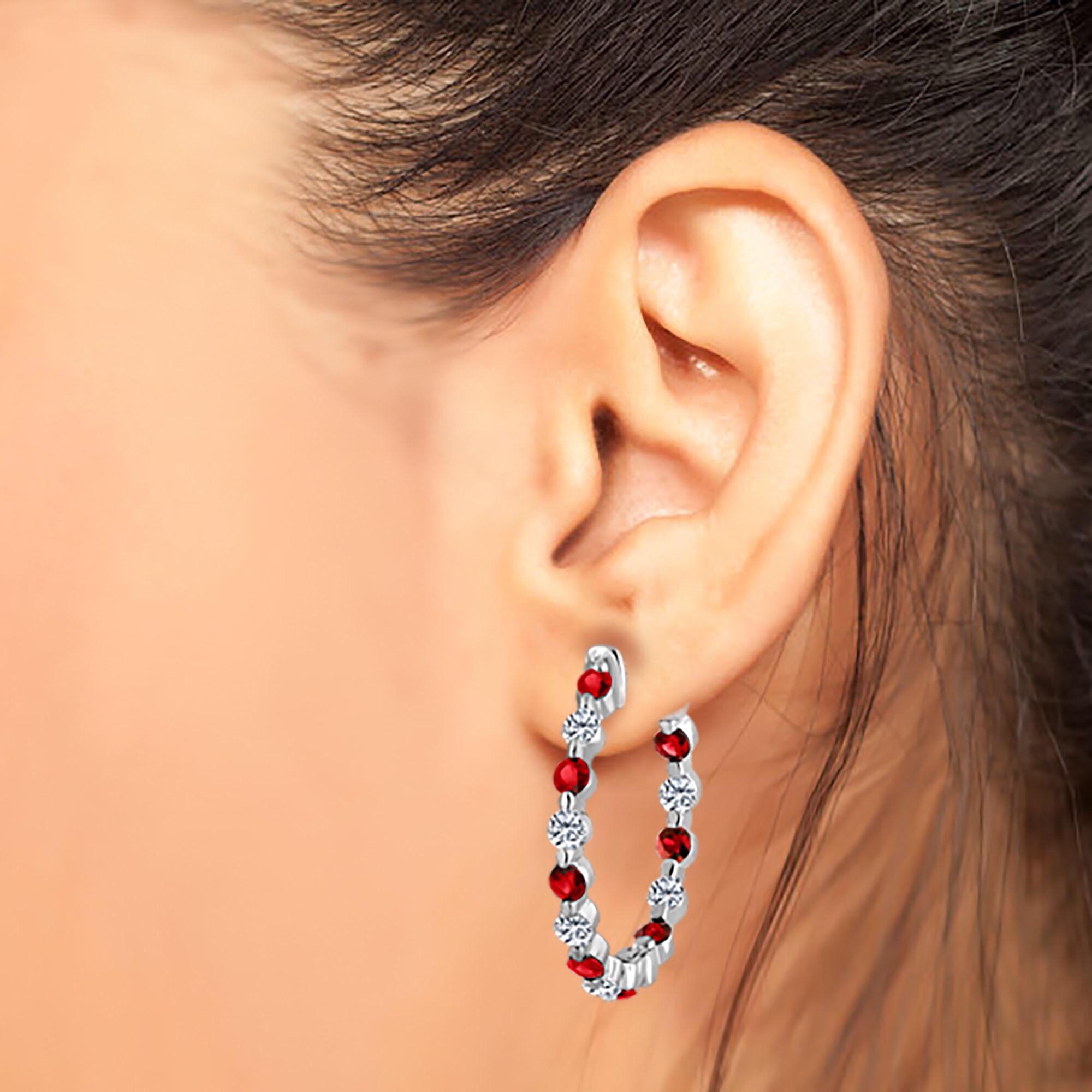 Please Call our direct line 6468461904 8am-11pm daily closed on Saturdays 
Approx total weight: 2.20cts
Gorgeous deep red Rubies set with white diamonds. The width of the hoop measures about 3.10mm
Metal: 18kw
Diamond Color: E-F 
Diamond Clarity: