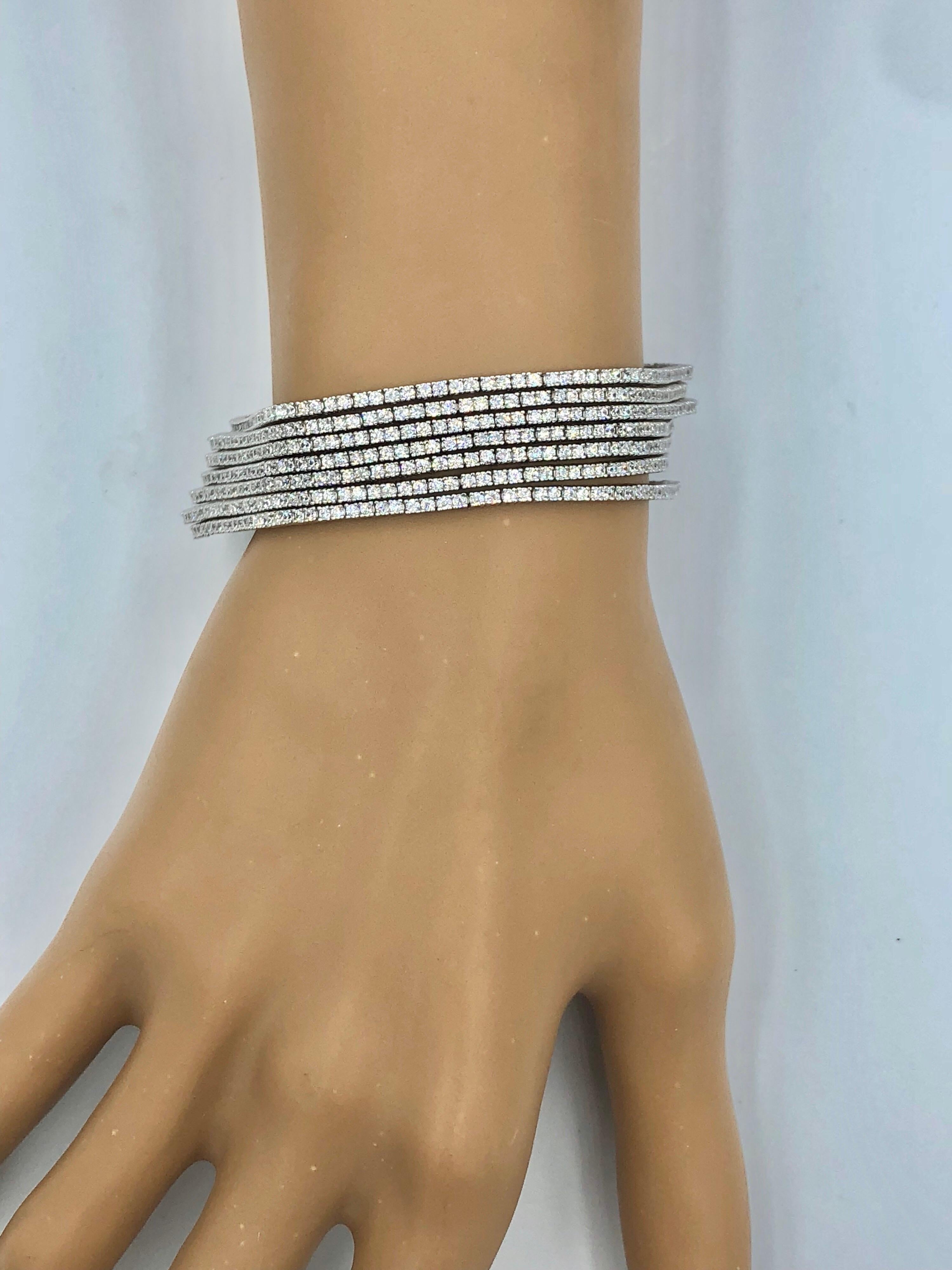 18k Gold Bracelet with Seven rows of diamonds that will cover your entire wrist with diamonds! 
7 inches long 
Available in all wrist lengths, and can be ordered in either yellow or rose gold. Approximately 623 diamonds totaling approximately 9.50