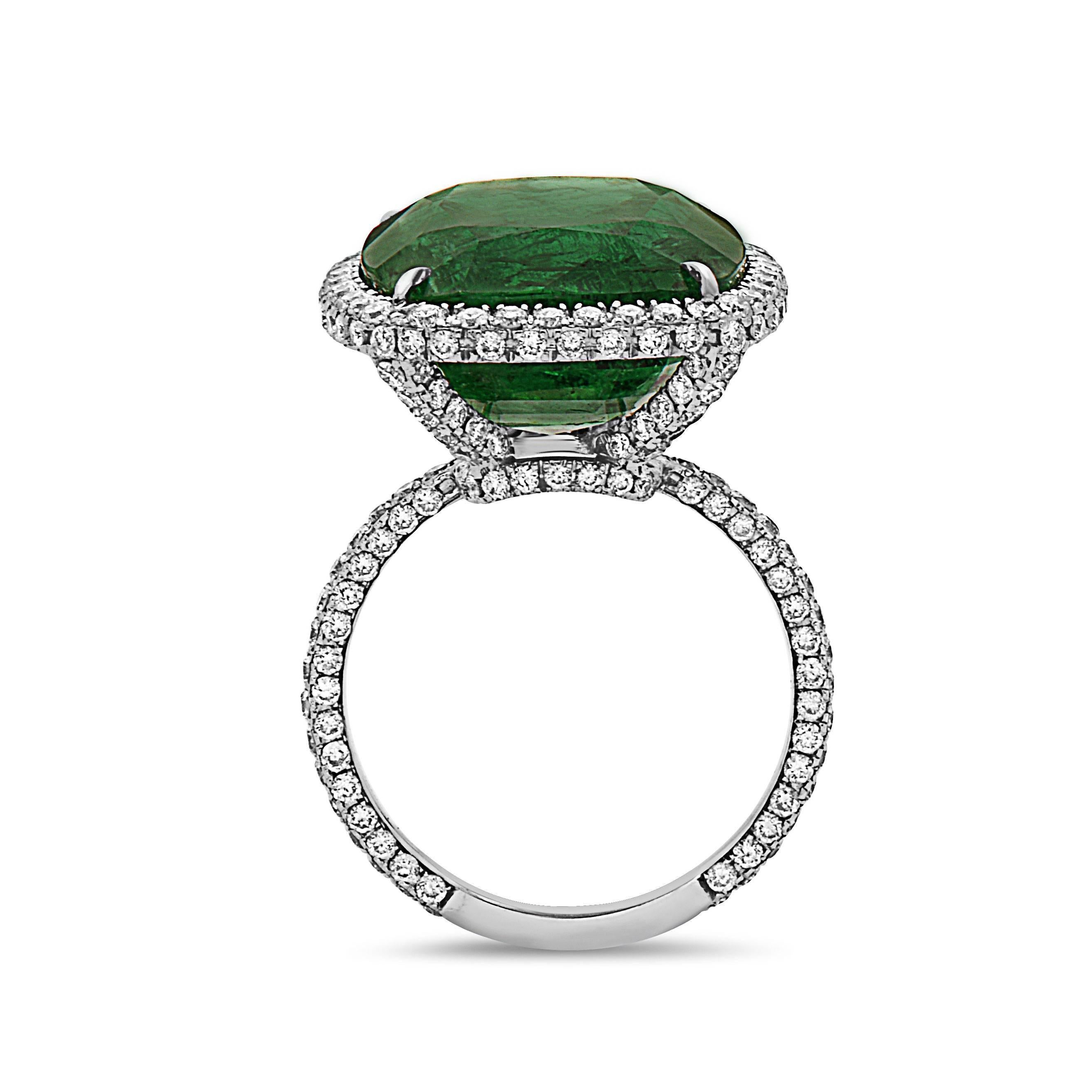 Approx total weight: 17.00 Carats
Center Cushion Emerald: Deep rich Green Color absolute gem. This is the ideal emerald. 
Diamond Color: E-F
Diamond Clarity: Vvs 
Cut: Excellent 
As noted we are vetted and rated a Top Seller on 1stdibs falling into