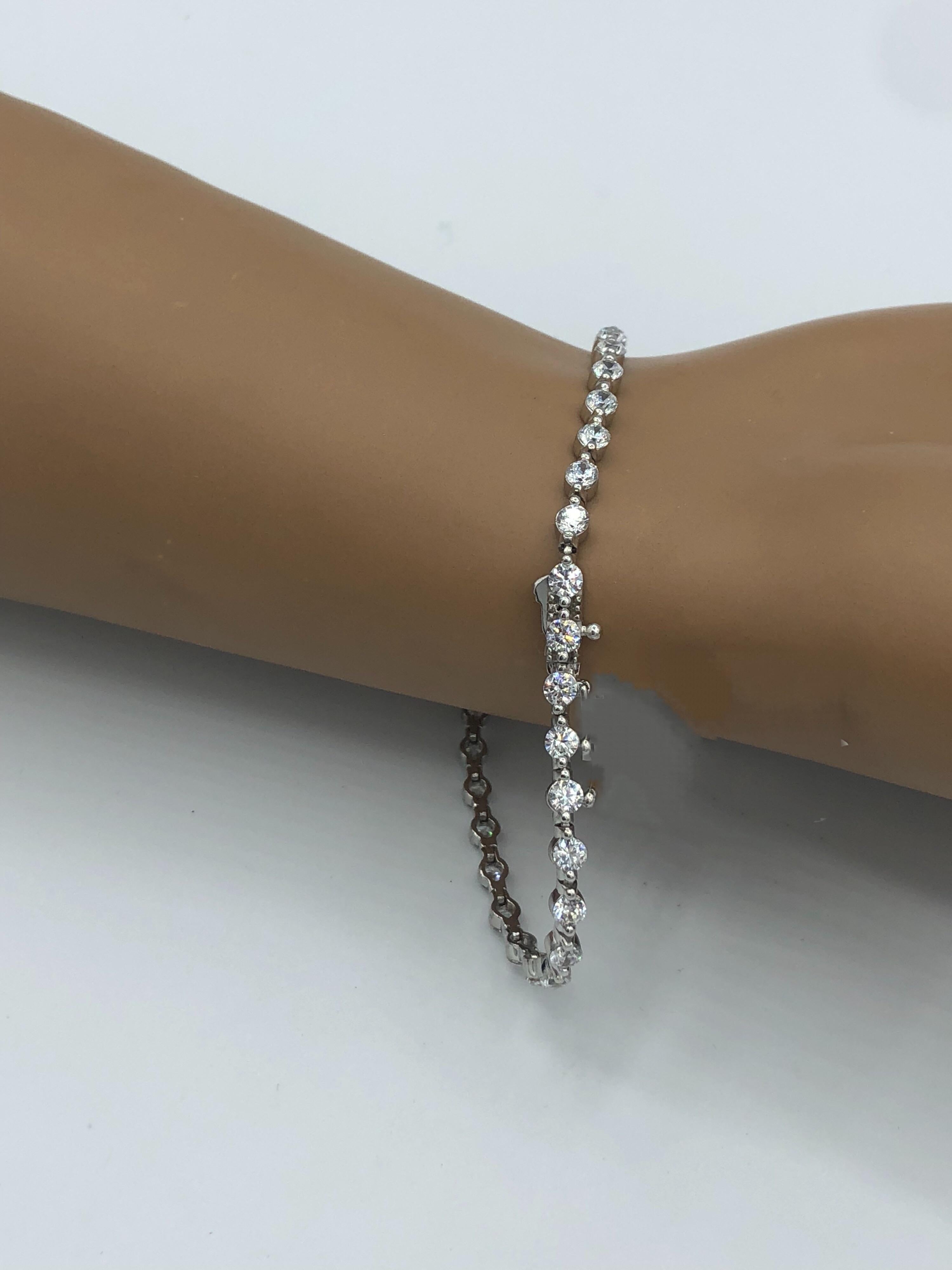 Emilio Jewelry Trademark Floating Diamond Bracelet .10 Carat Each Stone In New Condition In New York, NY
