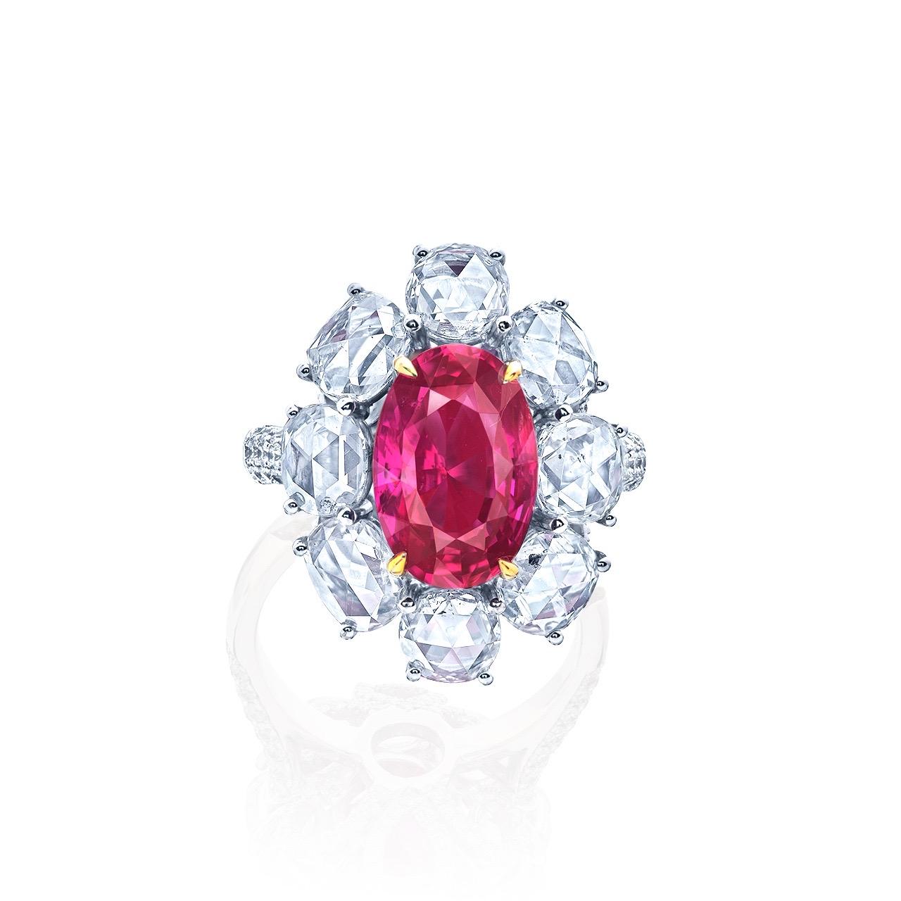 From Emilio Jewelry New York, a well known and respected dealer wholesaler located on New York's iconic Fifth Avenue. 
Certified Center stone just over 4.65ct Mozambique No Heat pigeon blood high quality Ruby. The Ruby is high in luster and