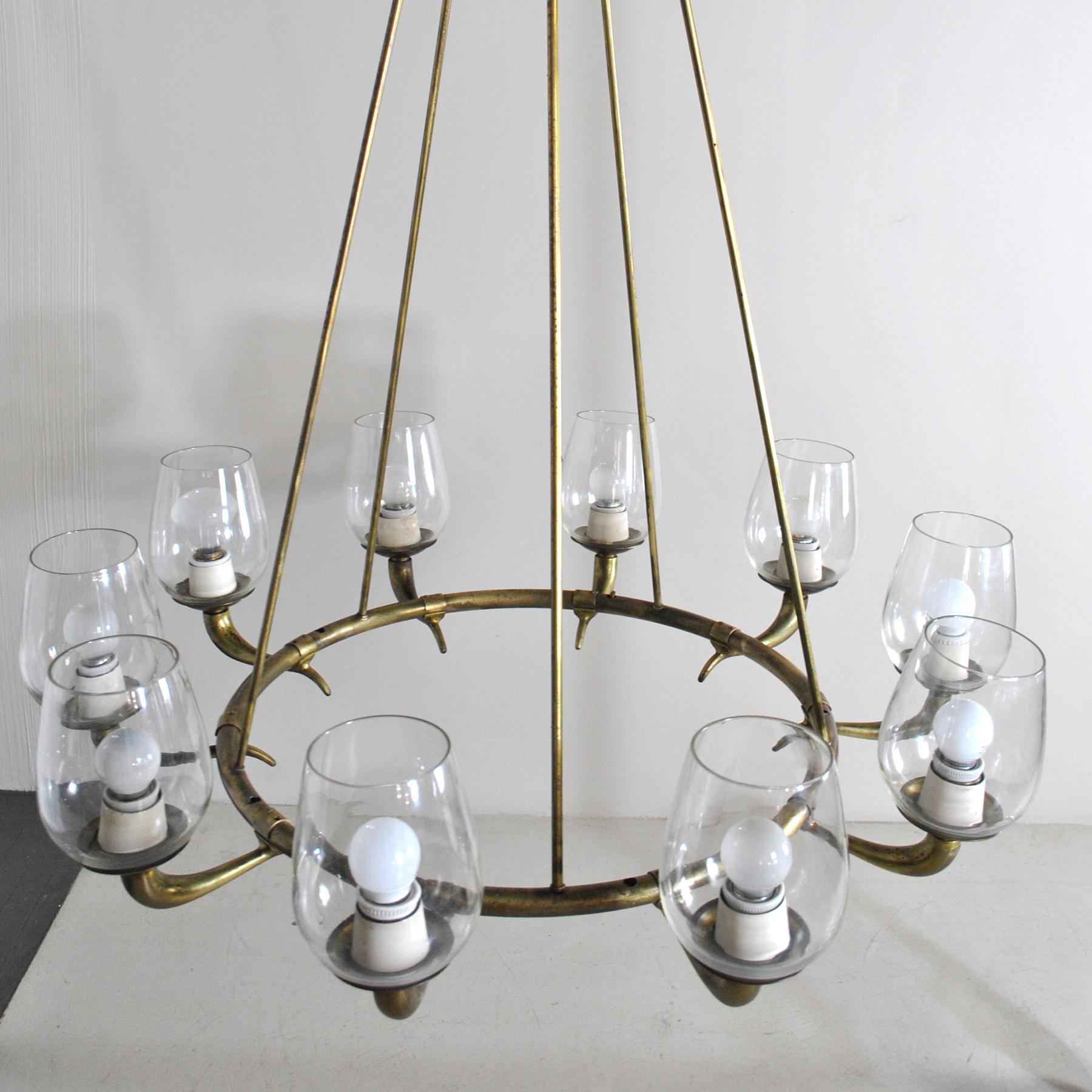 Ten-light suspension chandelier, brass structure, design Emilio Lancia attr. from the late 1940s.