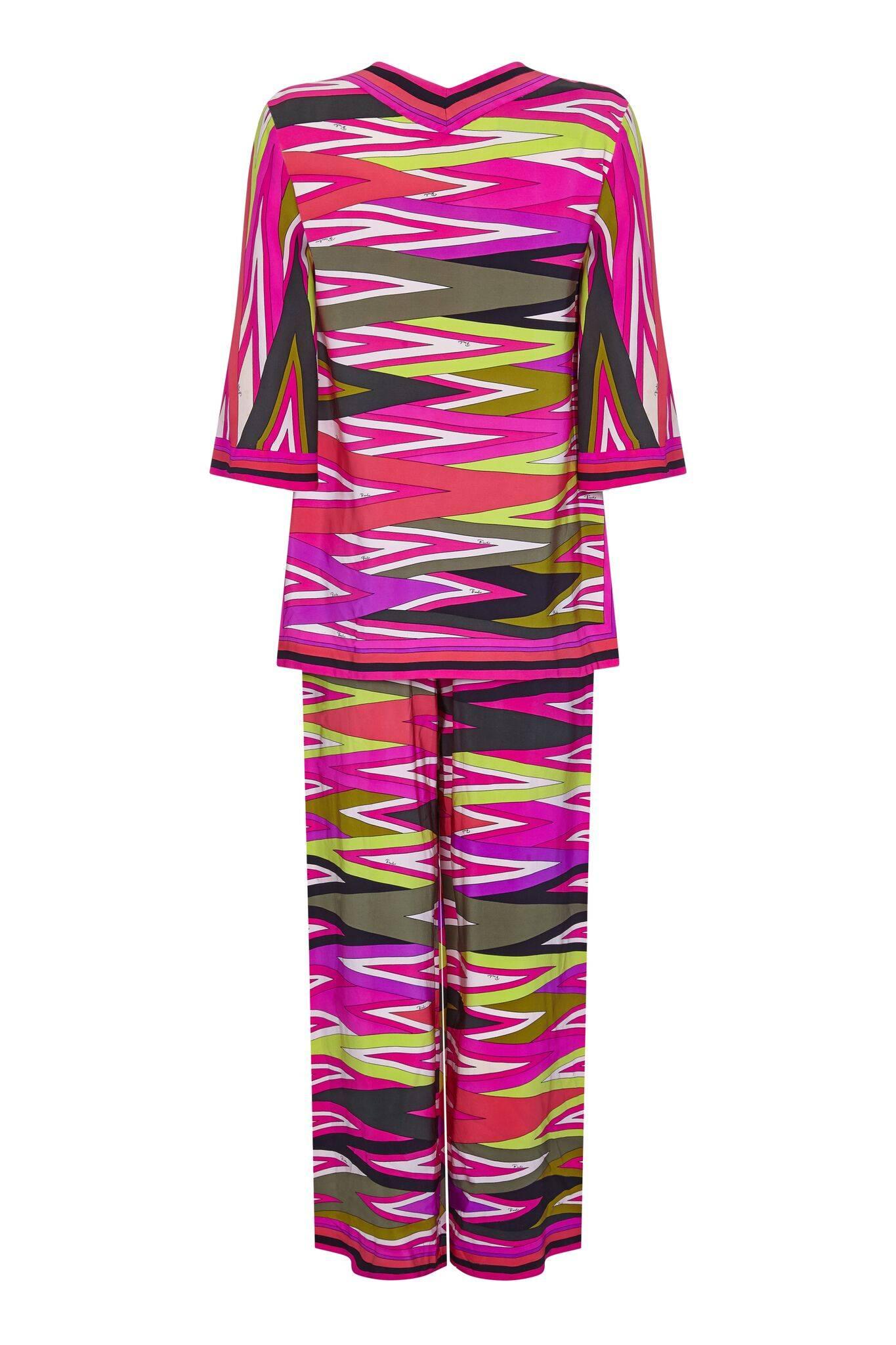 This fabulous and rare late 1960s or early 1970s Emilio Pucci silk trouser set is a fine example of this designer's celebrated signature style. A statement status brand throughout the 1960s, Pucci was synonymous with casual 'at-home' wear in bold