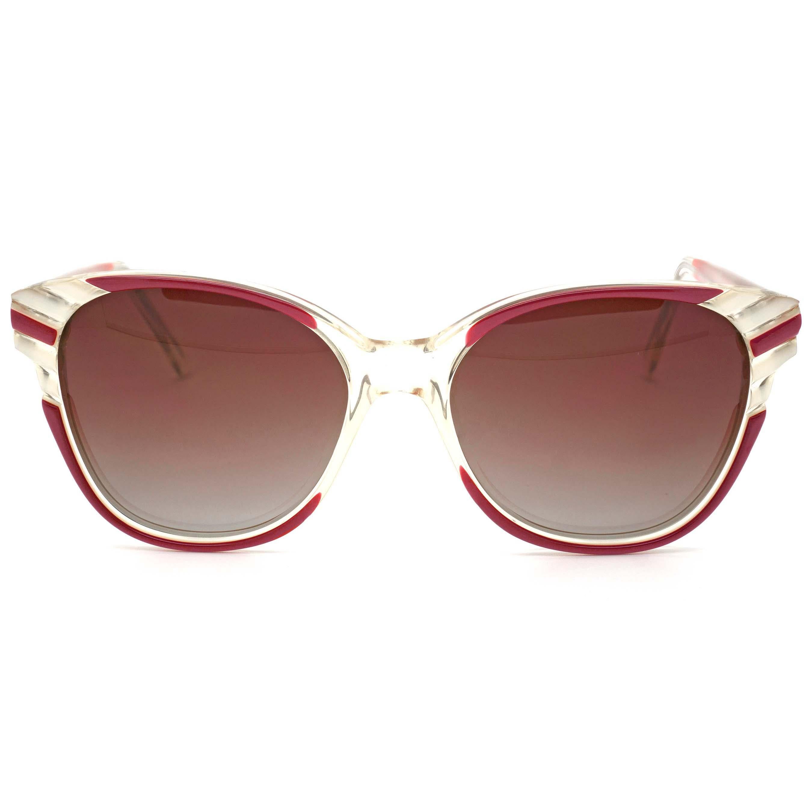 MAKE: Emilio Pucci
MODEL: PC 843 - N10
MADE IN: Paris
ERA: 1970s
CONDITION: New Old Stock [never worn]

DIMENSIONS:
Lens width: 55 mm  /  2 3/16 in
Lens height: 52 mm  /  2 1/16 in
Bridge: 20 mm  /  13/16 in
Temple-to-temple width: 135 mm  /  5 5/16
