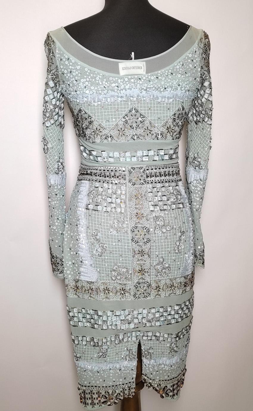 EMILIO PUCCI

 AQUA SILK CHIFFON FULLY BEADED DRESS

The dress is covered in bugle beads, sequins, rhinestones, pearls, and silk embroidery. The dress has an elegant round neckline, front and back with a narrow bias detail around it. 
There is long