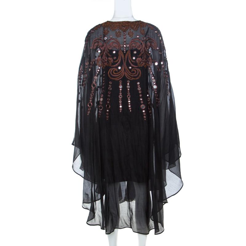 This kaftan dress from Emilio Pucci is a creation for every woman's closet. The black kaftan is made from quality fabrics and designed with gorgeous mirror embellishment, embroidery and a soft, slowy shape.

Includes:Price Tag