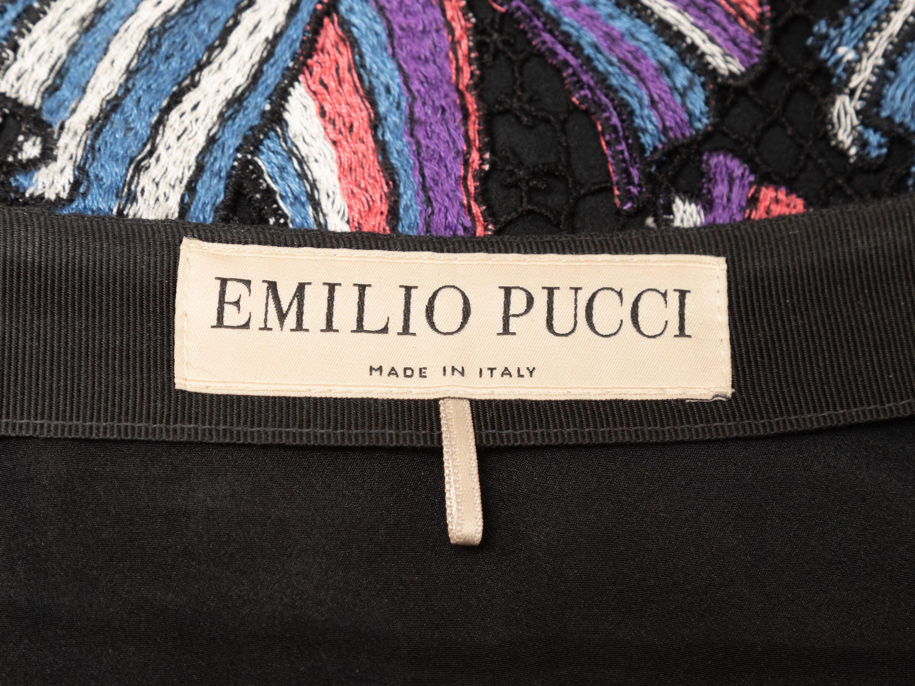 Product Details: Black and multicolor knee-length embroidered skirt by Emilio Pucci. Scalloped hem. Side zip closure. Designer size 38. 26