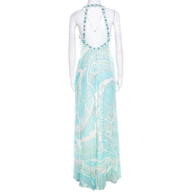Grandeur mixed with style, you cannot go wrong with this Emilio Pucci dress. Bold and beautiful, this blue dress, designed with a maxi length, is a perfect choice, be it any occasion. Crafted in silk, this elegant dress has a cutout back detail and