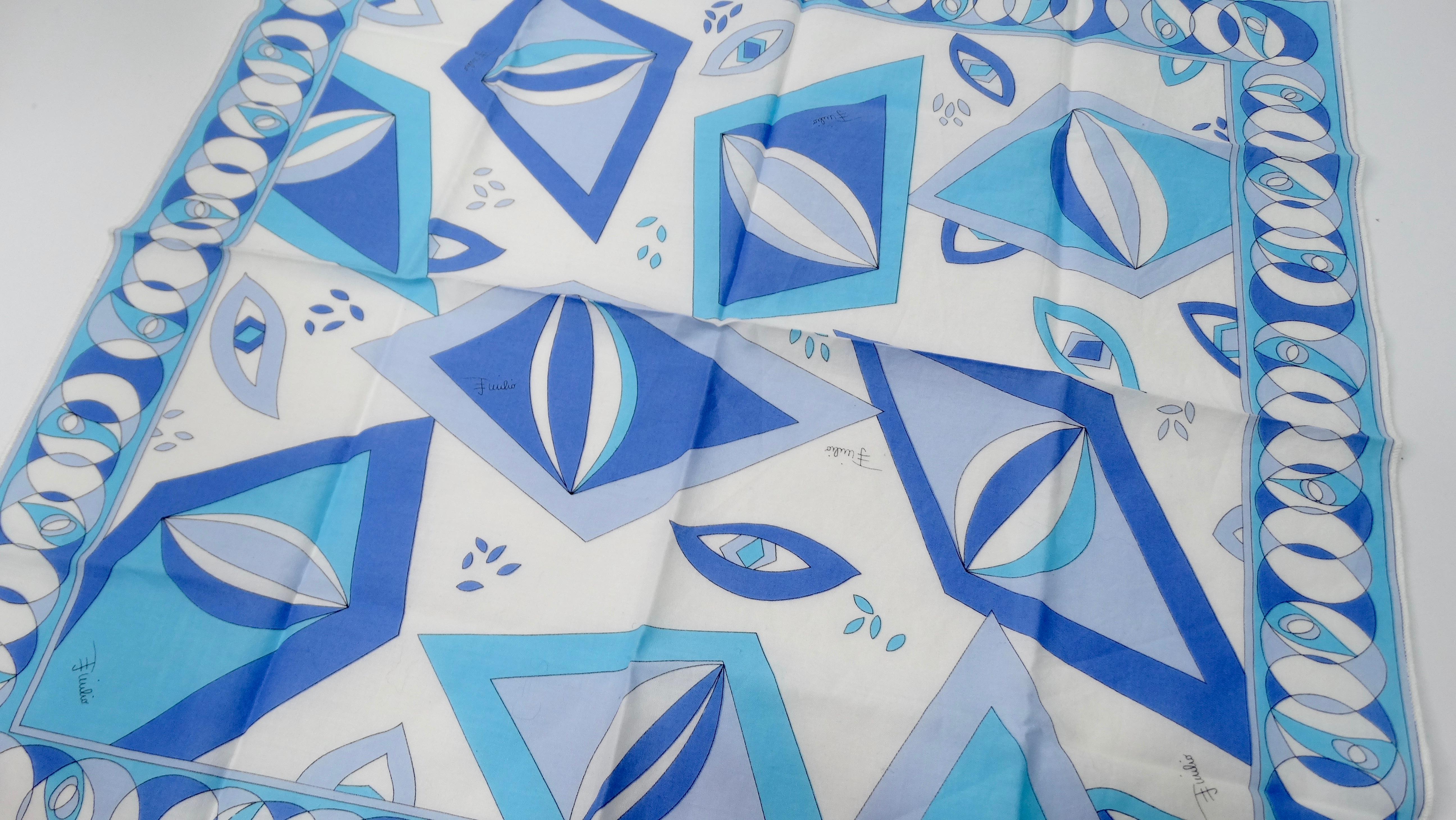 Add this Pucci to your collection! Circa 1960s, this adorable cotton scarf features one of Pucci's signature geometric designs with various shades of blues. Emilio Pucci written throughout, made in Italy. This piece is versatile! tie in your hair,