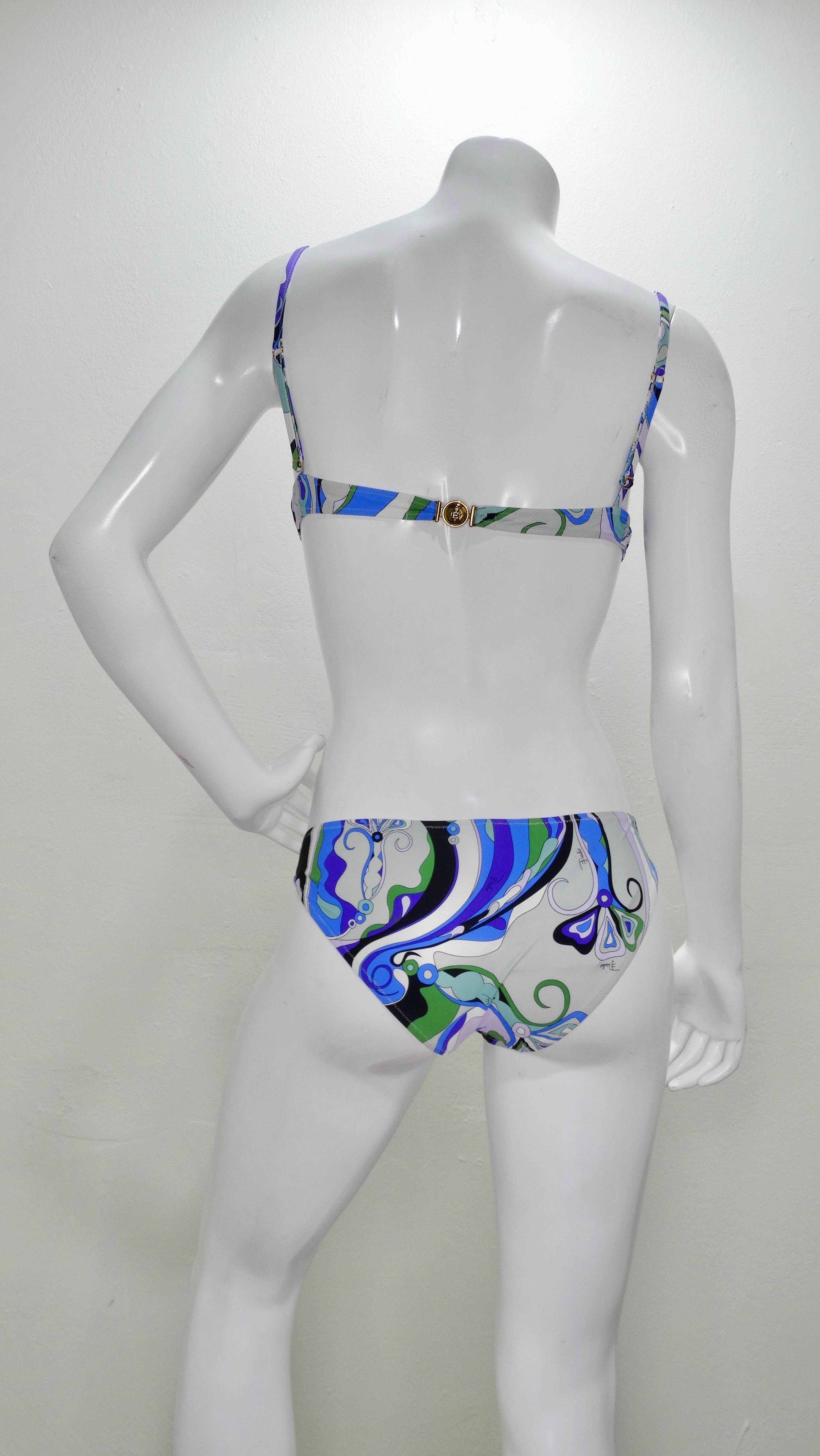 Summer Sexy... Circa 2000s, this Emilio Pucci bikini features one of Pucci's signature abstract prints in shades of blue, purple and green. Padded top with adjustable straps and a Pucci embossed back closure. Best fits a small or medium. Made in