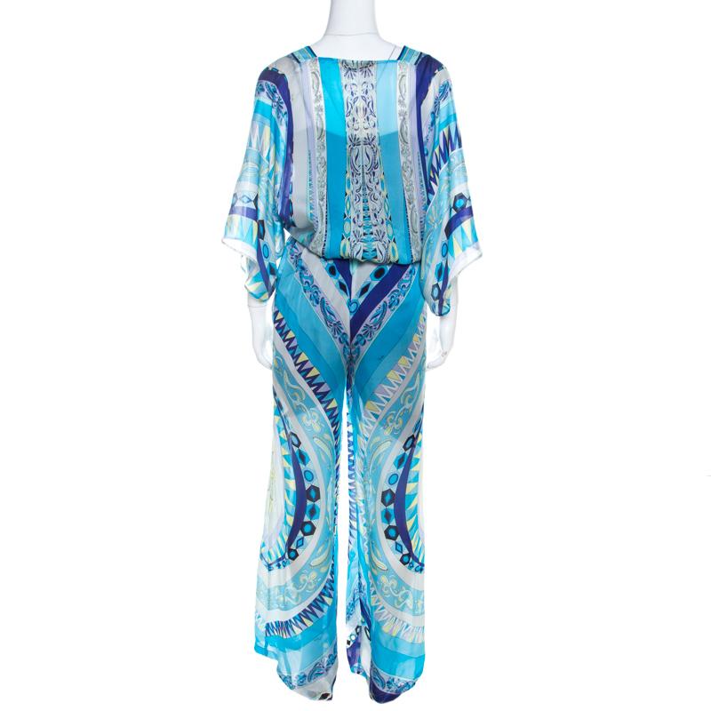 Made from quality silk, this jumpsuit by Emilio Pucci has been styled with signature prints all over. It features dolman sleeves and a stretchable band at the waist. Style this jumpsuit with flats for an easy-fashion impression.

Includes: The