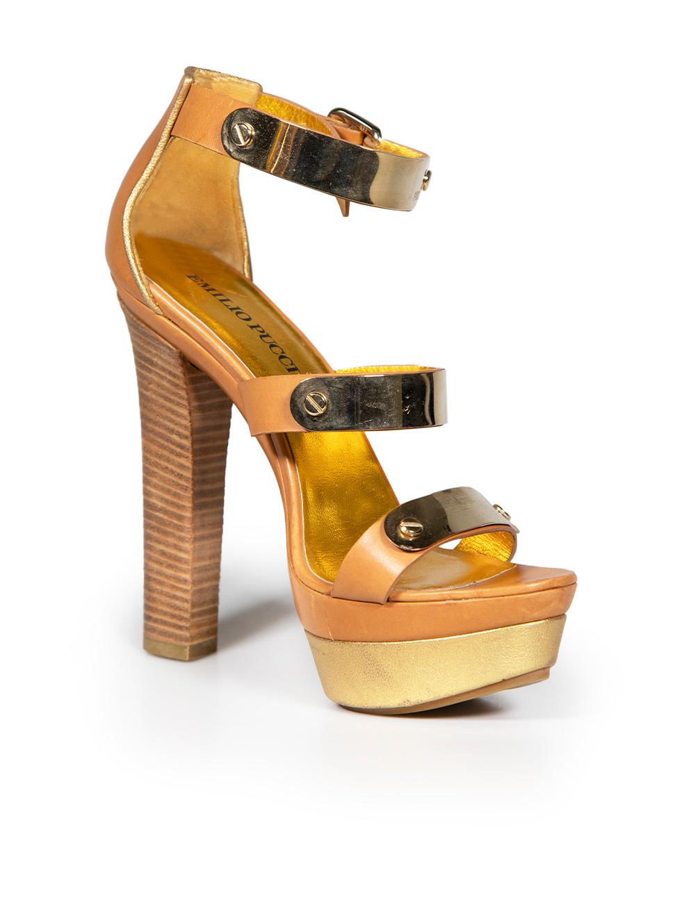 CONDITION is Good. Minor wear to the heels is evident. Light wear to the leather and platform edges and scratches to metal hardware on this used Emilio Pucci designer resale item.
 
 
 
 Details
 
 
 Brown
 
 Leather
 
 Sanndals
 
 High heeled
 
