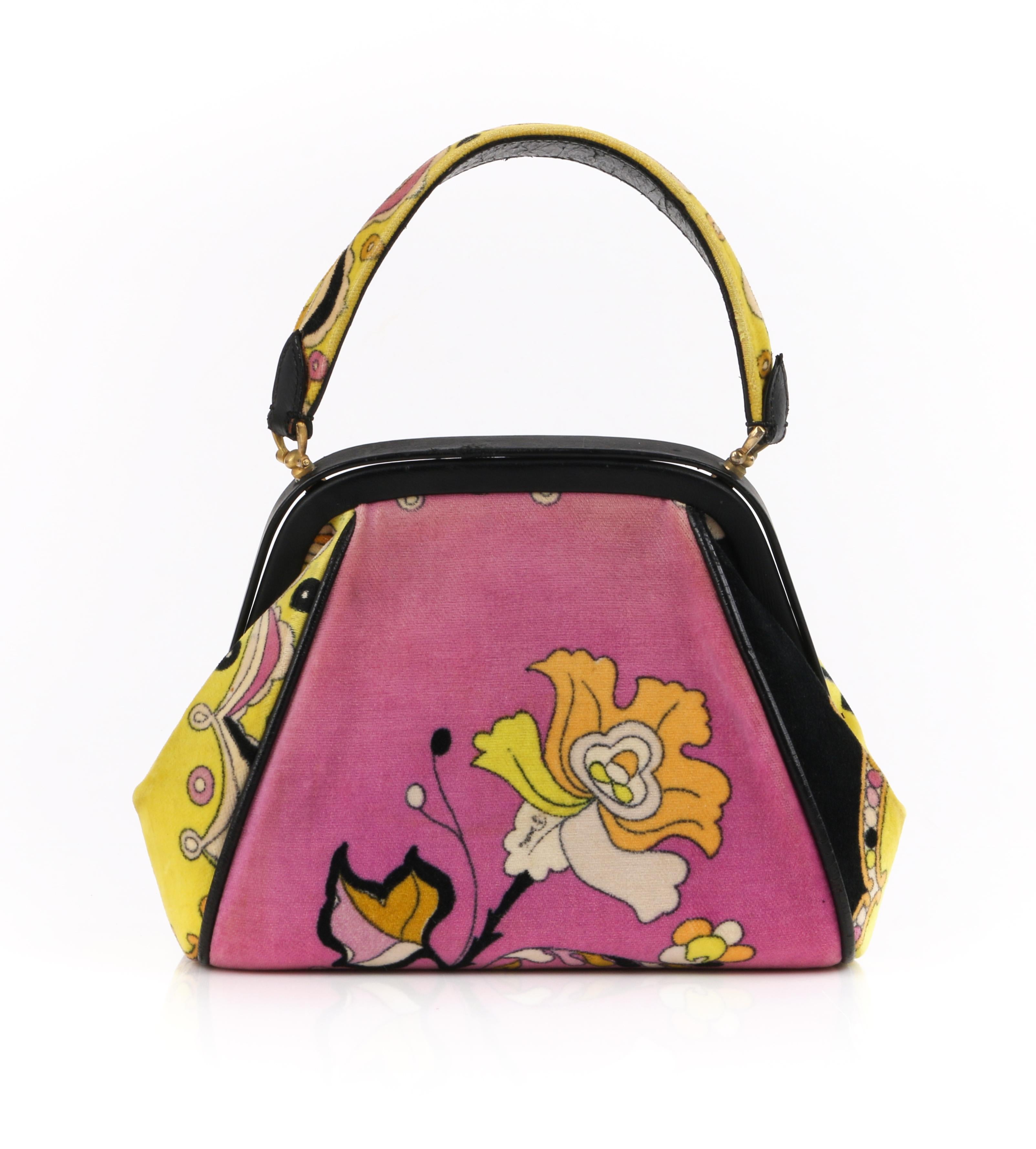 EMILIO PUCCI by Jana c.1960s Floral Signature Print Velveteen Structured Handbag
 
Circa: 1960s
Label(s): Emilio Pucci Bags by Jana
Designer: Emilio Pucci
Style: Handbag
Color(s): Shades of pink, yellow, white, black
Lined: Yes
Unmarked Fabric