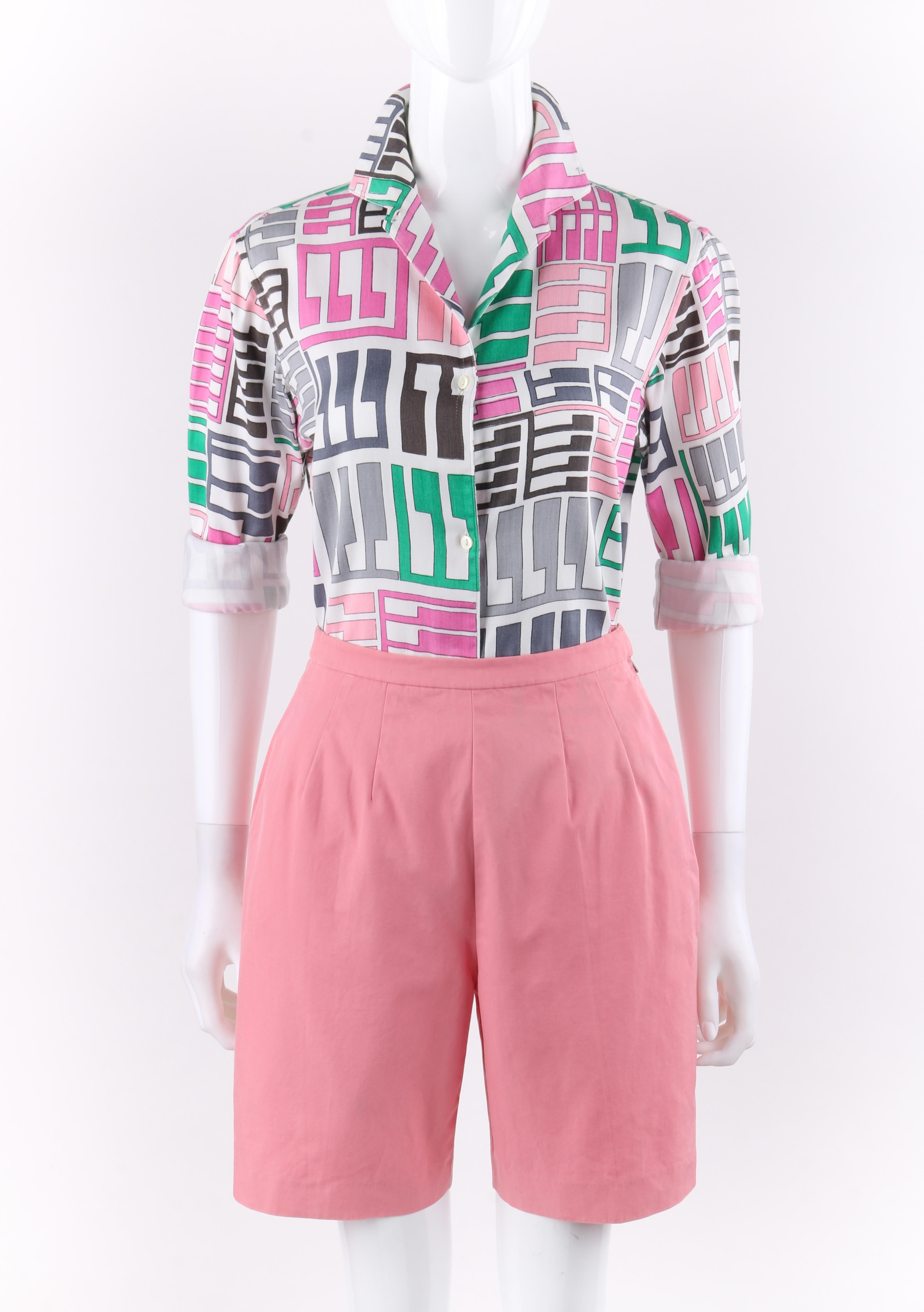 EMILIO PUCCI c.1960’s 2 Pc Pink Multi-color Tribal Cotton Button Front Shirt Shorts Set
 
Circa: 1960’s 
Label(s): Emilio Pucci  
Style: Button-Up Shirt, shorts 
Color(s): Shades of pink, green, grey, white and black. 
Lined: No
Marked Fabric